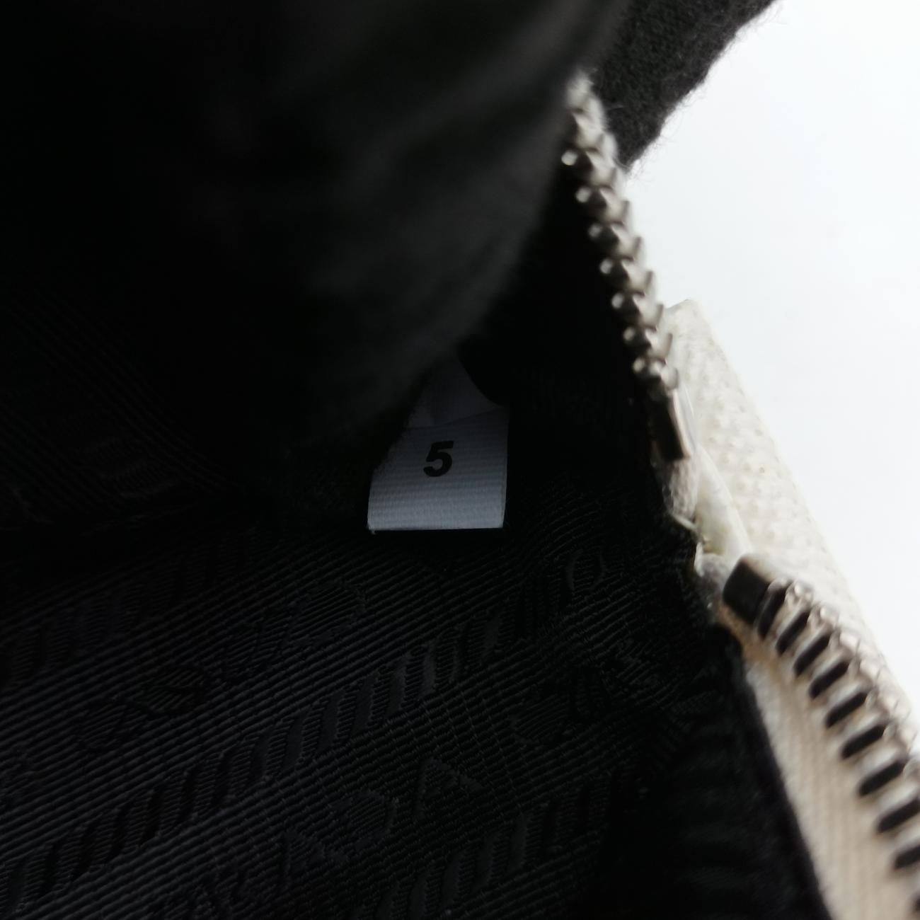 Triangle Logo Plate White SAFFIANO Leather 56 5