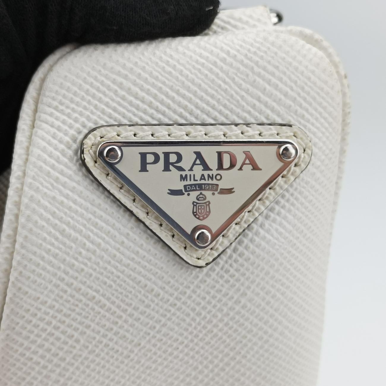 Triangle Logo Plate White SAFFIANO Leather 56 5