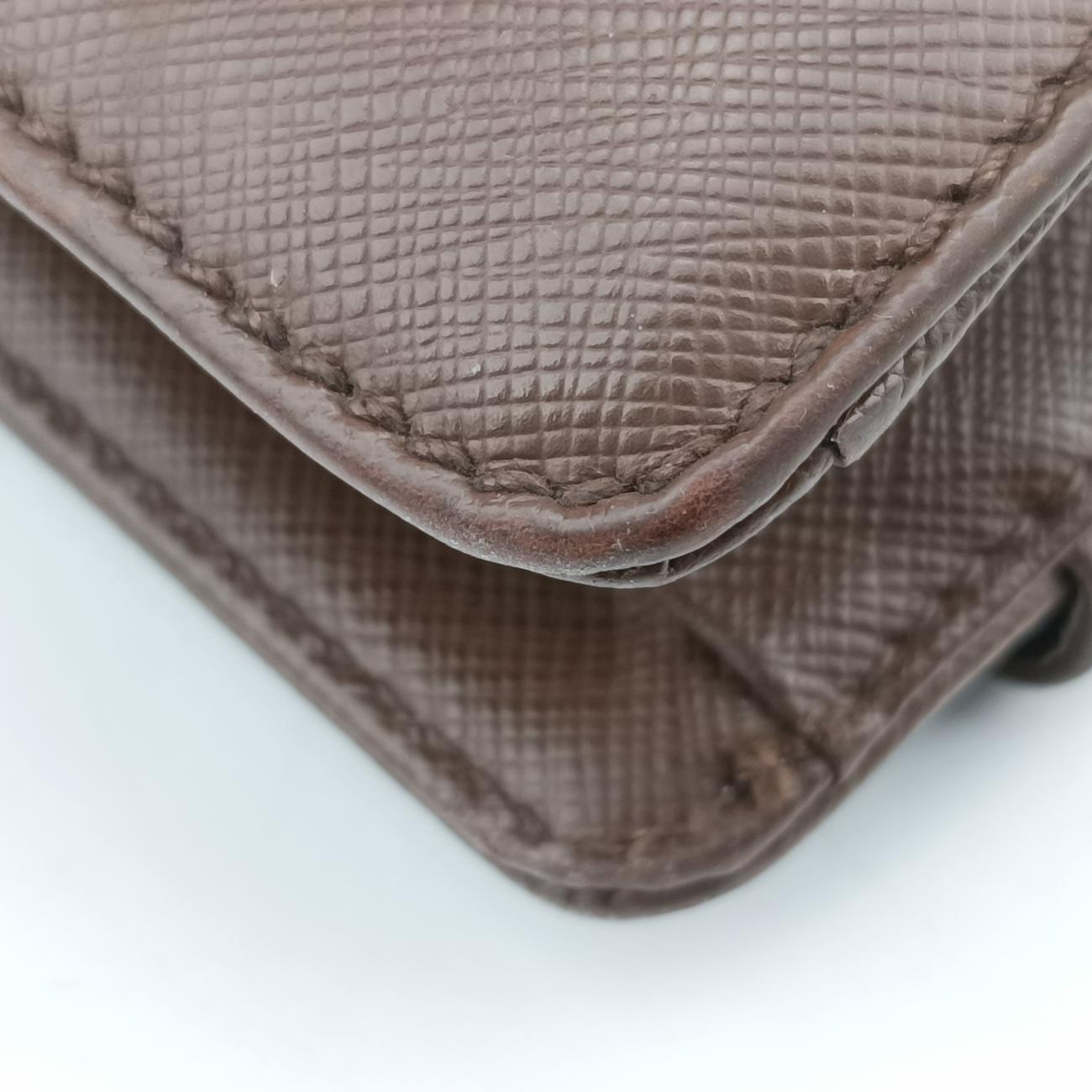 Triangle Logo Plate Brown Saffiano Leather 164