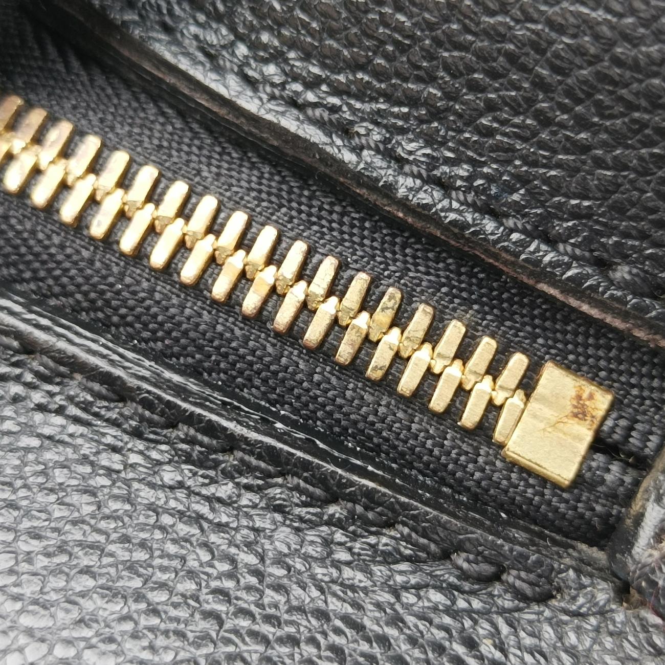 Montaigne GM Noir Monogram Empreinte SP0136