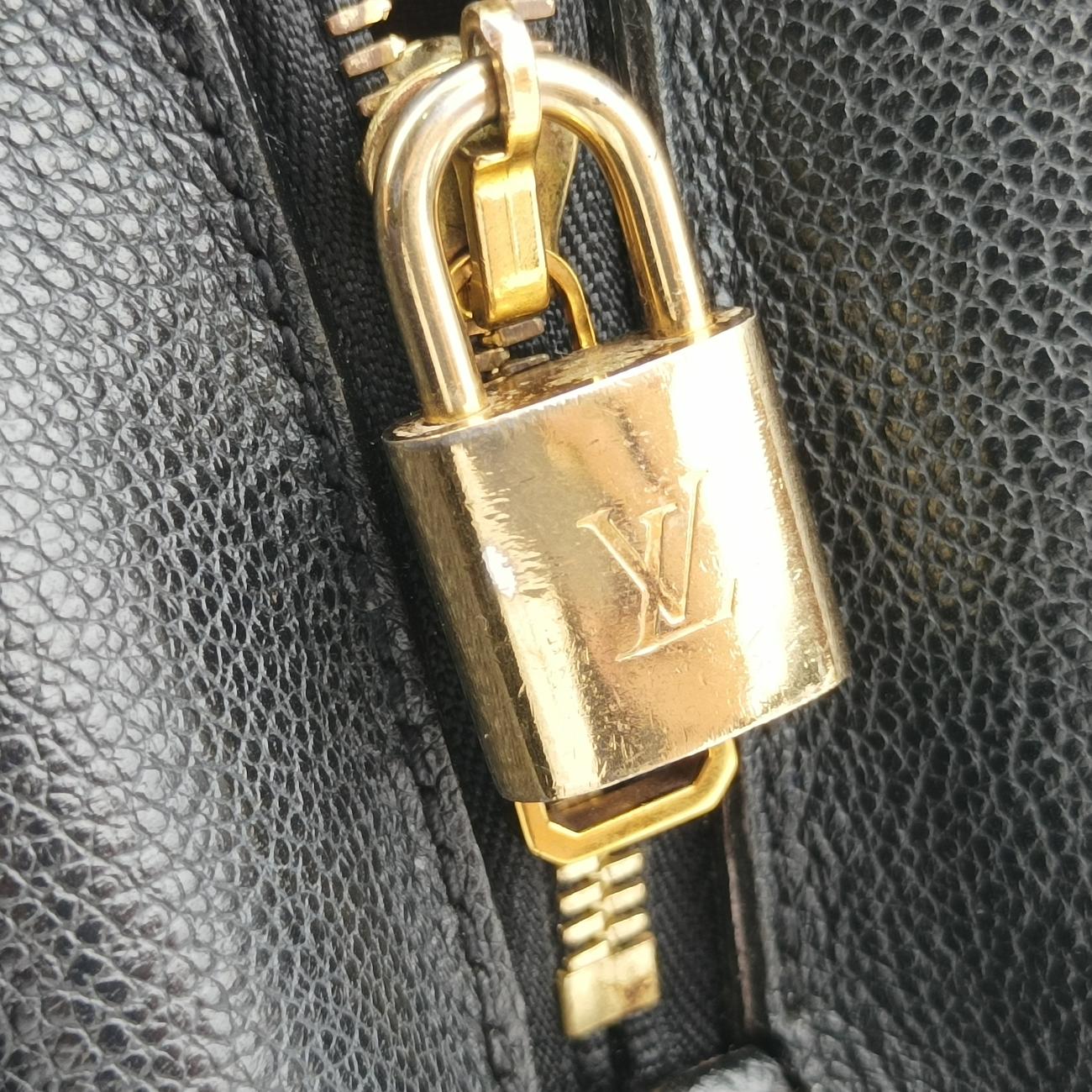 Montaigne GM Noir Monogram Empreinte SP0136