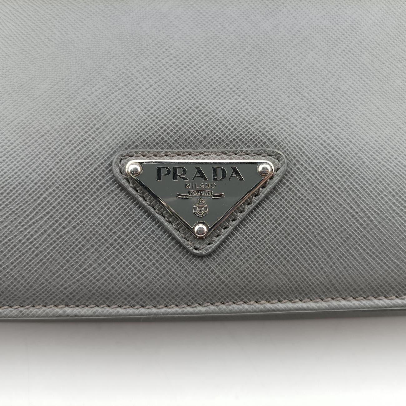 Triangle Logo Plate Grey Saffiano Leather 49
