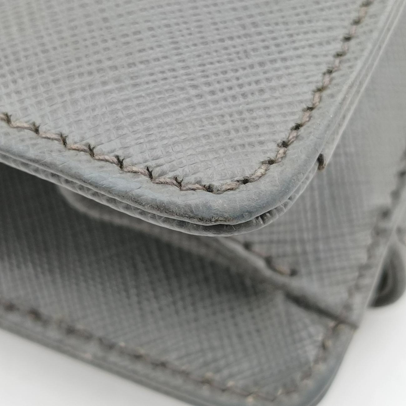 Triangle Logo Plate Grey Saffiano Leather 49