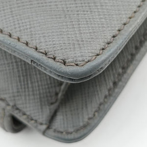 Triangle Logo Plate Grey Saffiano Leather 49