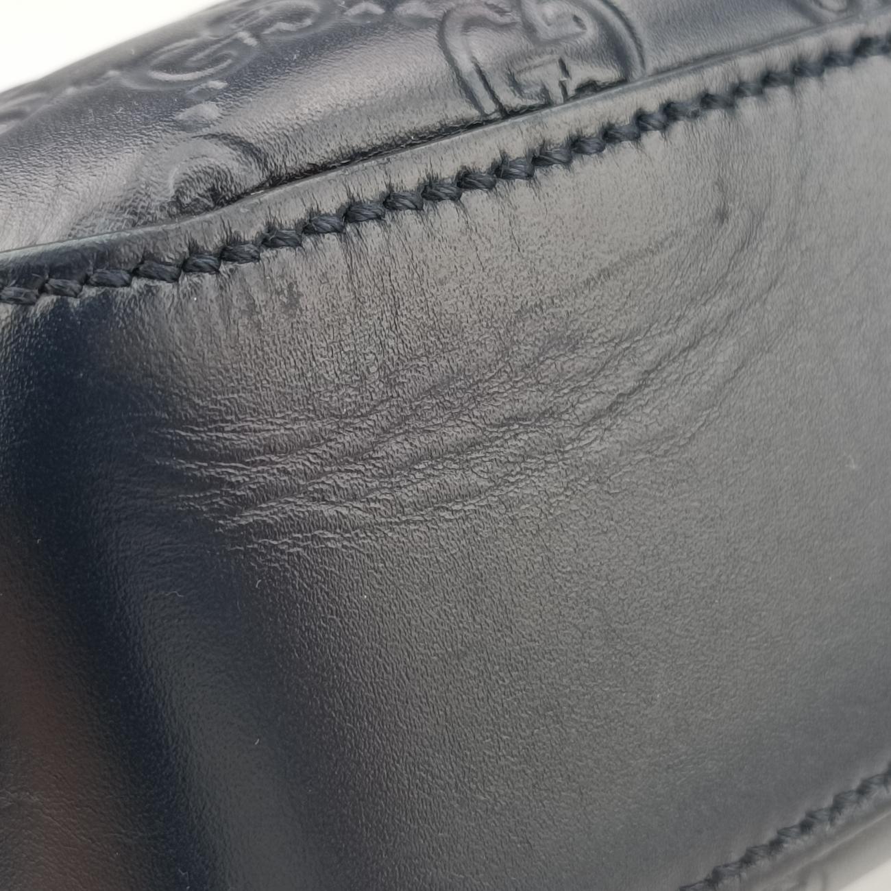 Guccissima Navy Leather B021456394