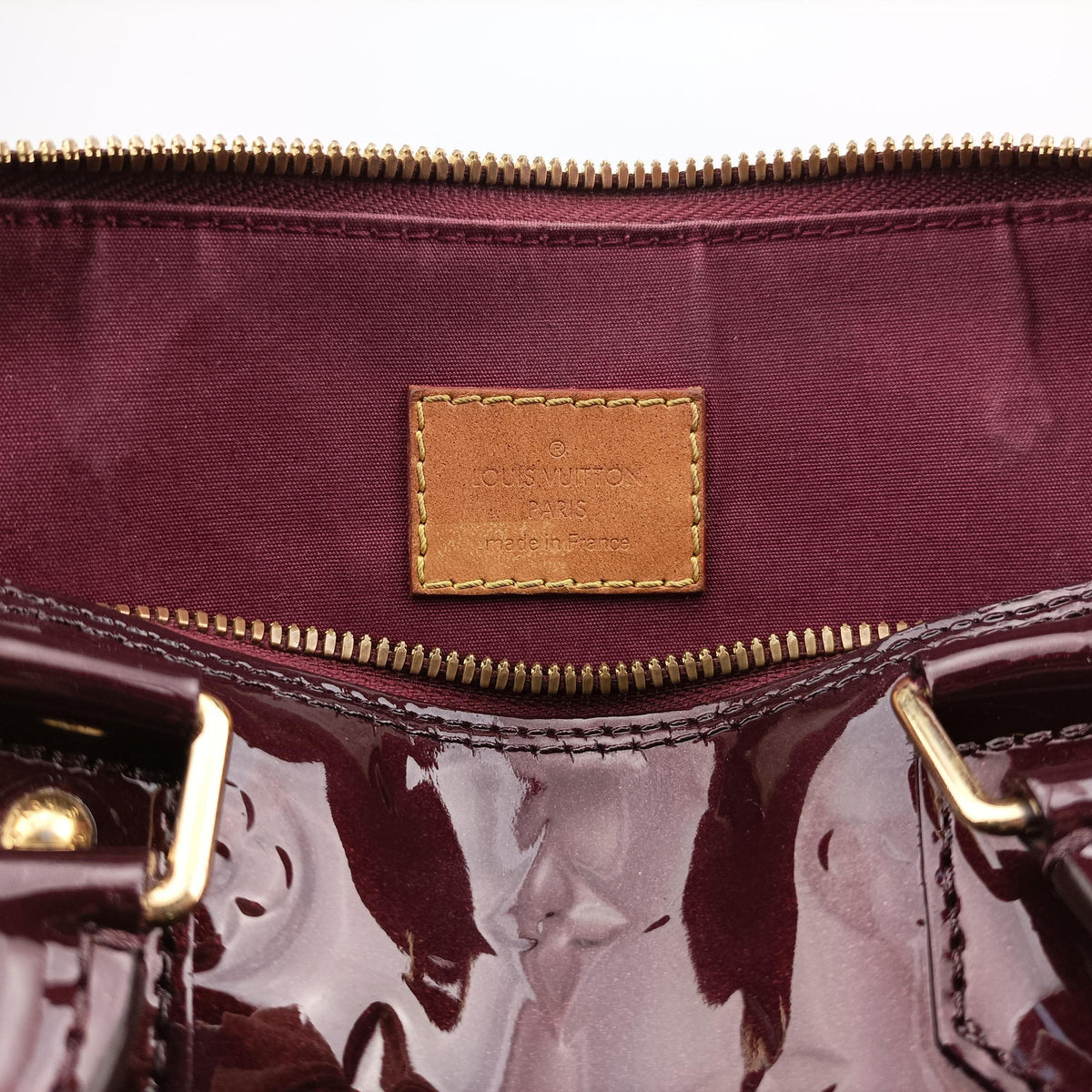 Vintage Louis Vuitton Alma PM Amarante Vernis M91691 handbag | stylenewstar