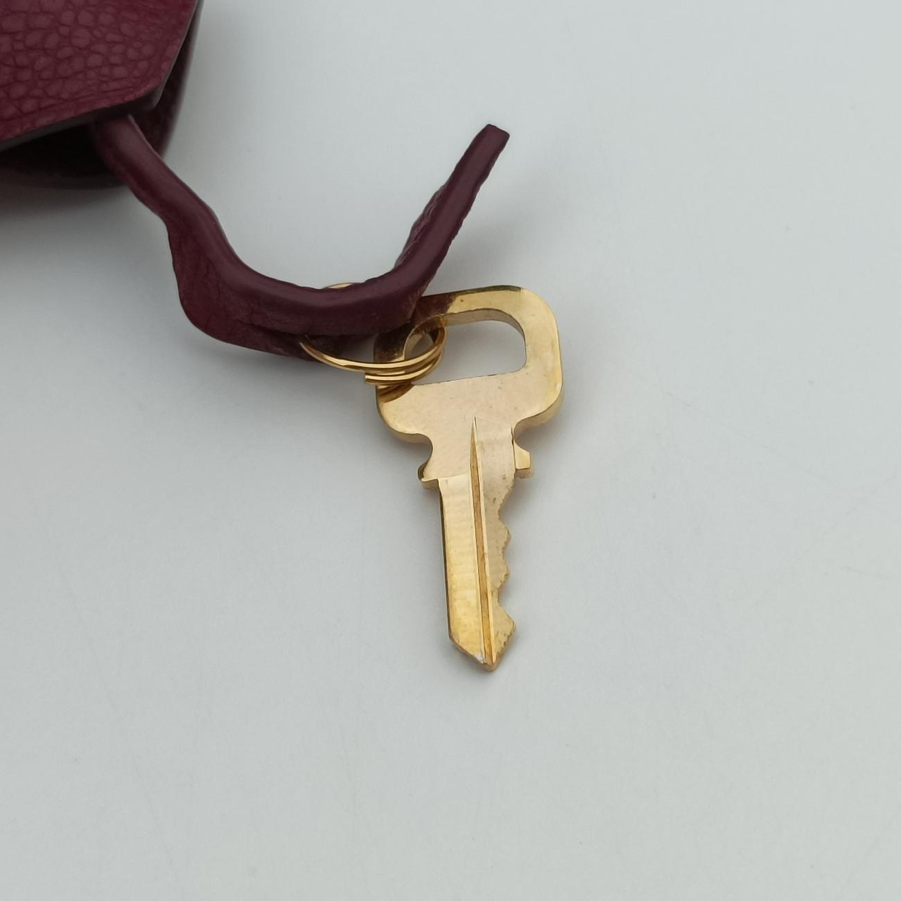 Speedy Bandoulière 25 Aurore Monogram Empreinte SP2112