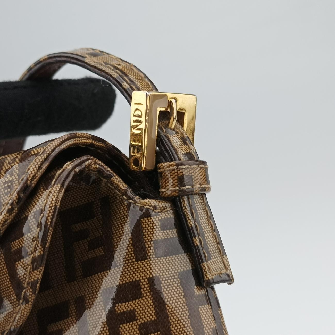 Pre-owned Fendi Baguette Brown PVC coated canvas 26796 handbag | stylenewstar