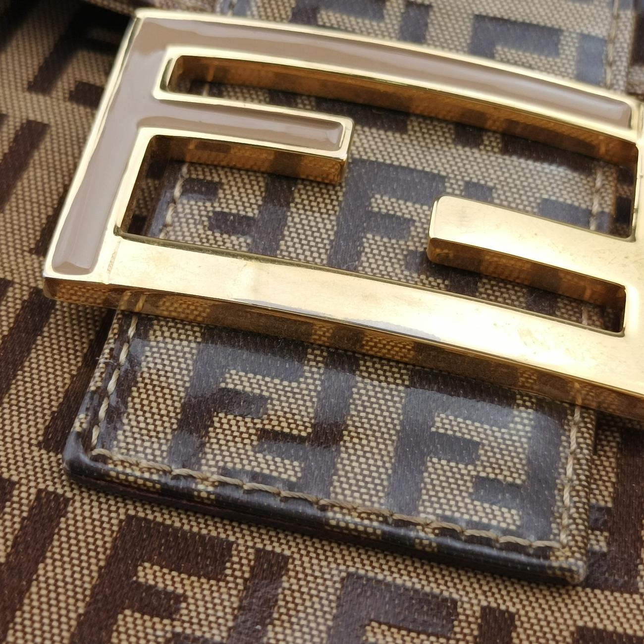 Pre-owned Fendi Baguette Brown PVC coated canvas 26796 handbag | stylenewstar