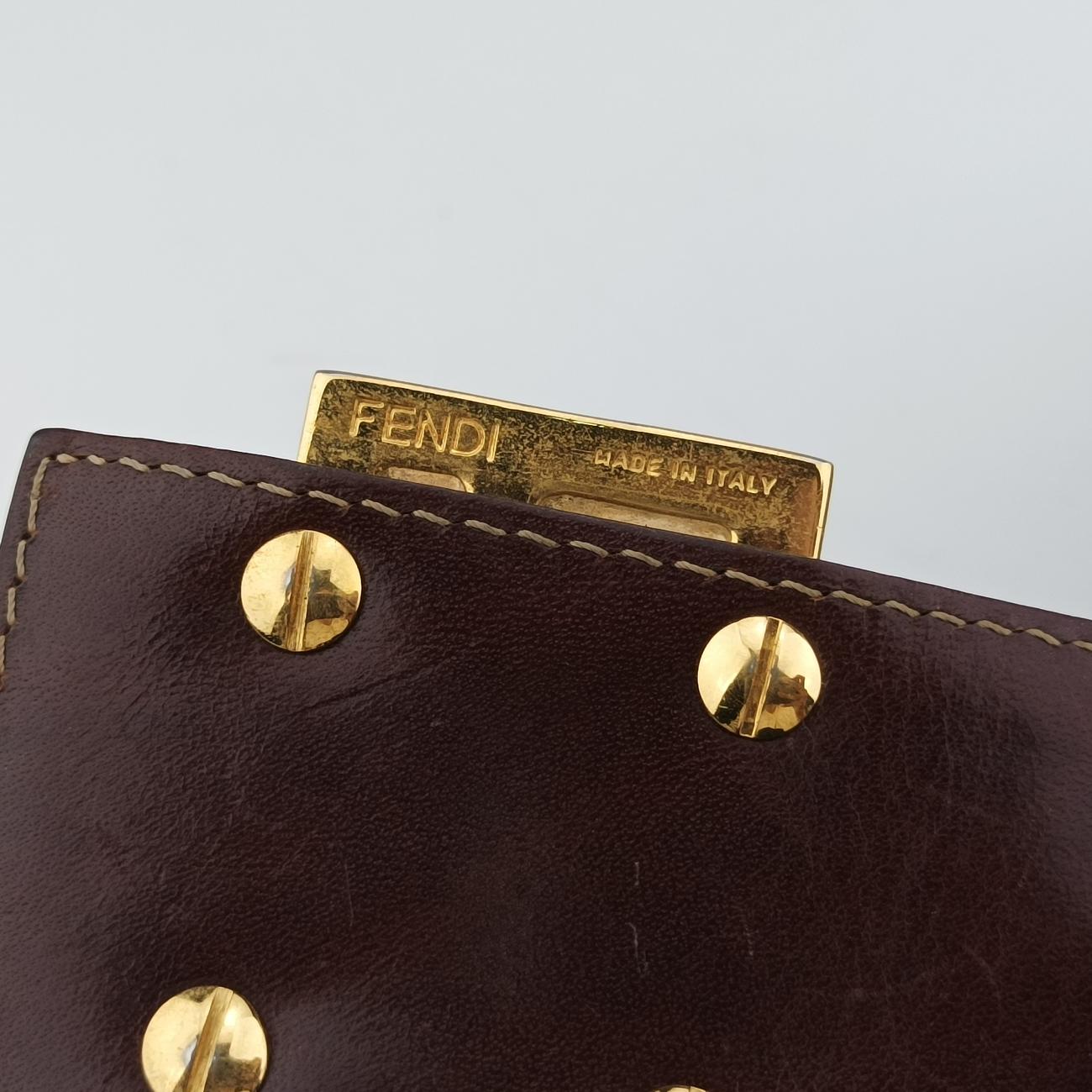 Pre-owned Fendi Baguette Brown PVC coated canvas 26796 handbag | stylenewstar