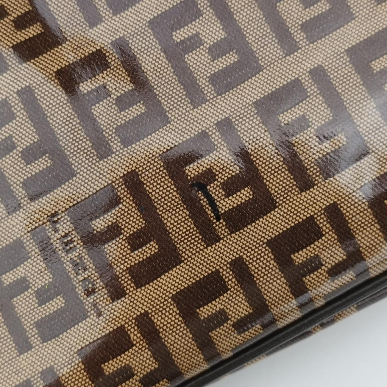 Pre-owned Fendi Baguette Brown PVC coated canvas 26796 handbag | stylenewstar