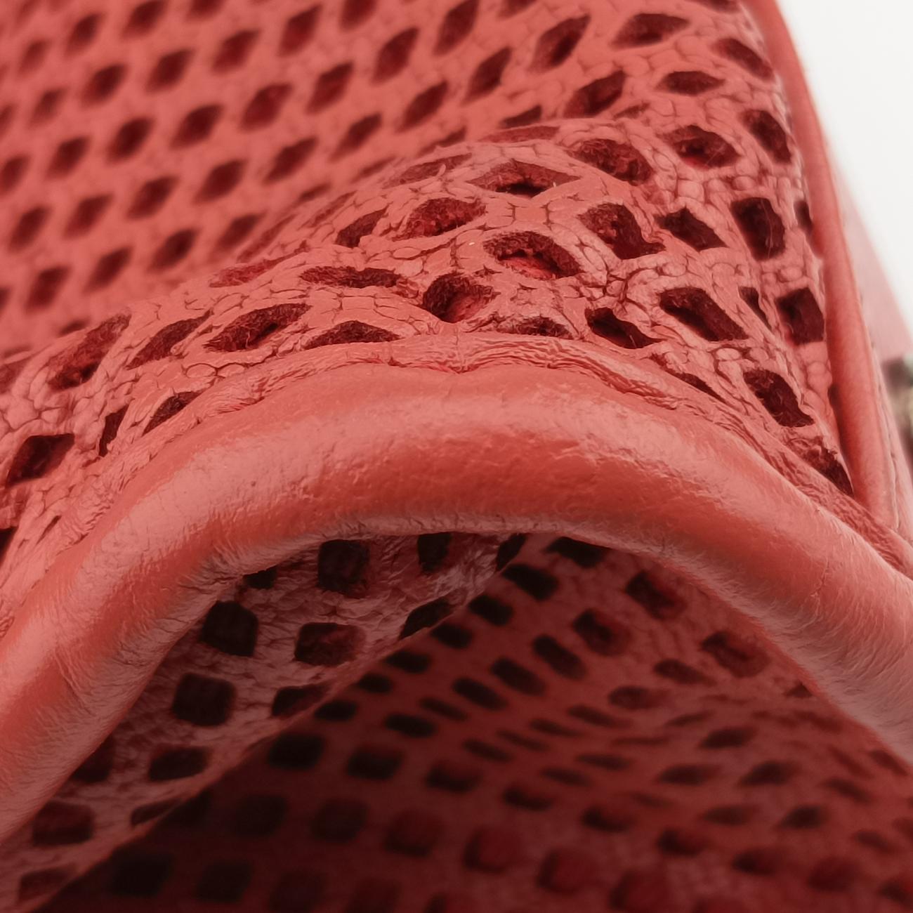 Vintage Chanel Up in the Air Perforated French Riviera Orange Leather A67654 shoulderbag | stylenewstar