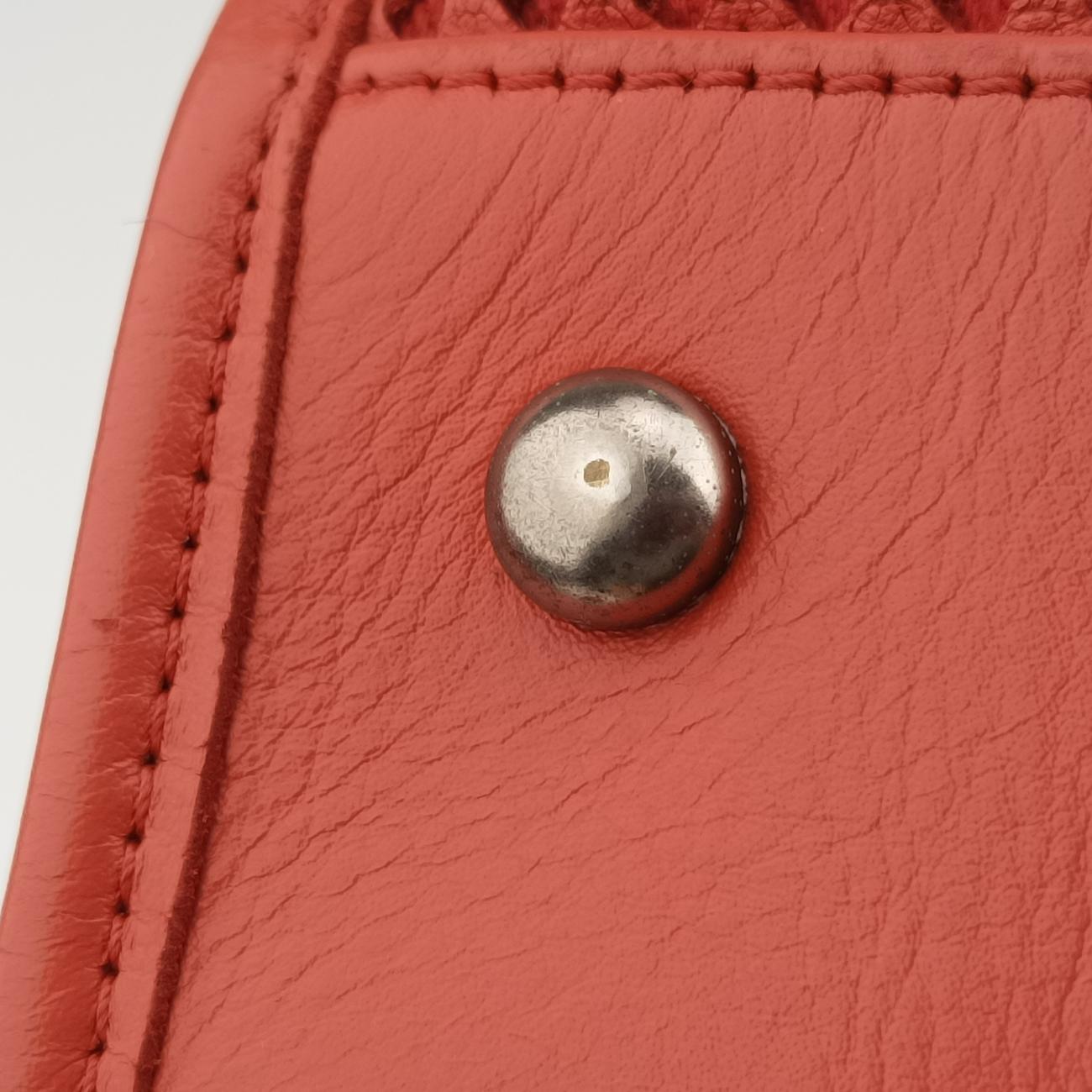 Vintage Chanel Up in the Air Perforated French Riviera Orange Leather A67654 shoulderbag | stylenewstar