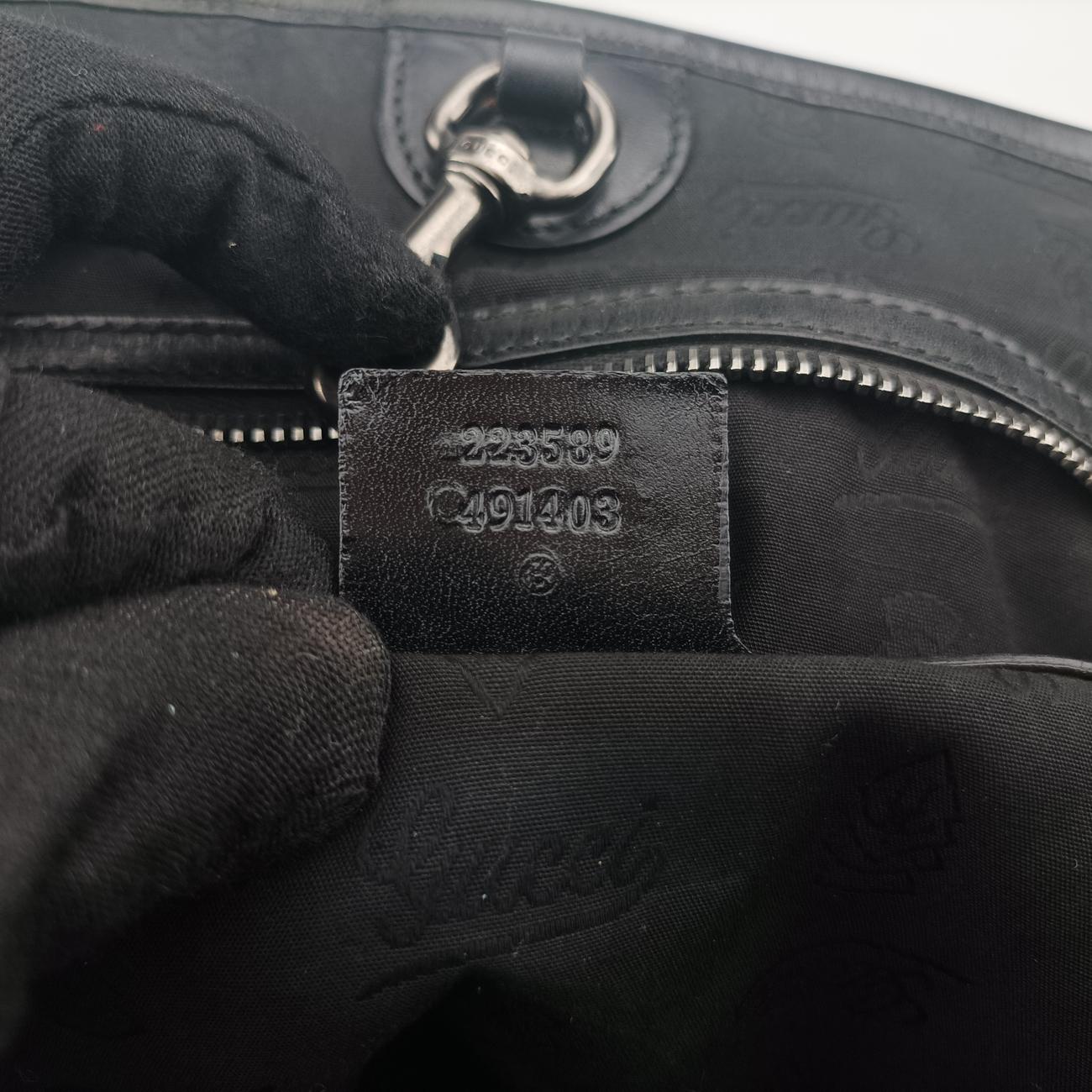 Pre-owned Gucci GG Imprime Black PVC coated canvas 223589 shoulderbag | stylenewstar