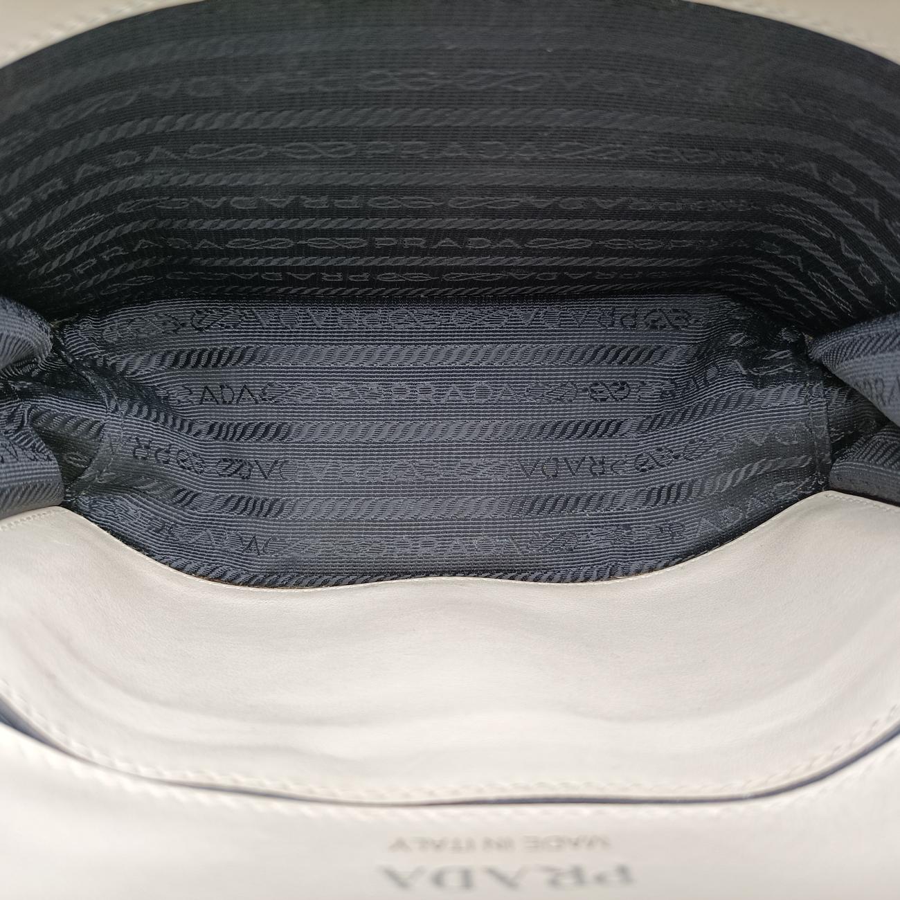 Secondhand Prada Plex ribbon White Leather 1BD067 shoulderbag | stylenewstar