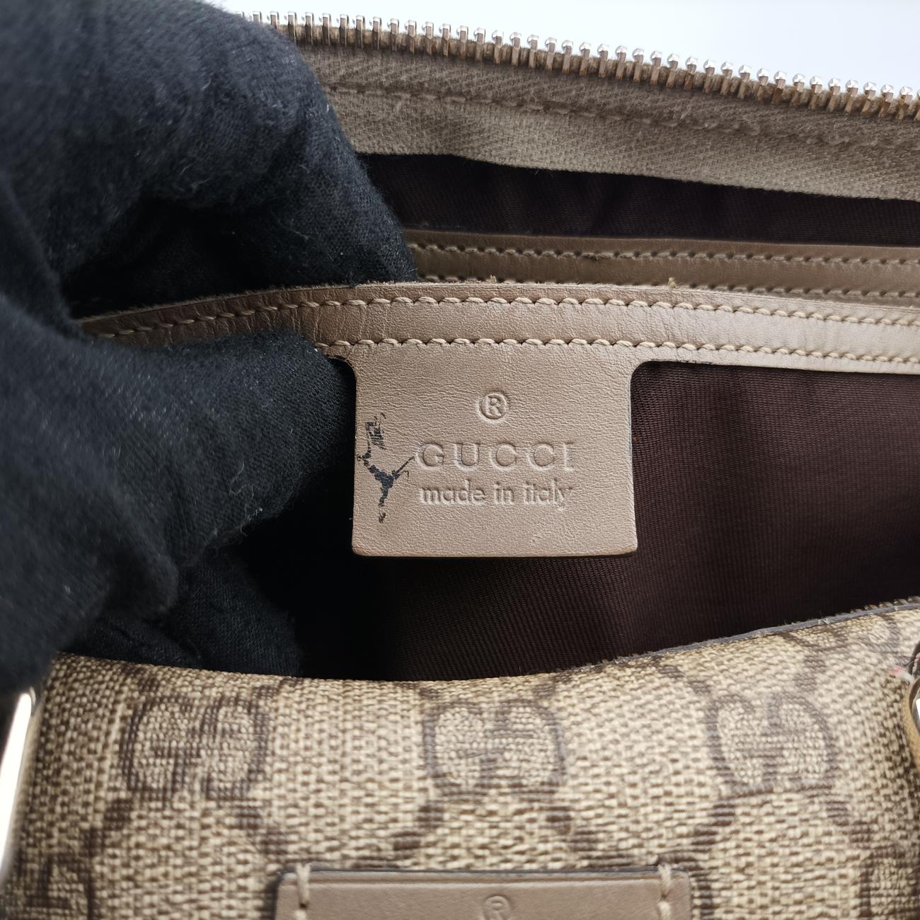 Pre-owned Gucci GG plus Spring Joy GG Supreme Brown PVC coated canvas 193603 handbag | stylenewstar