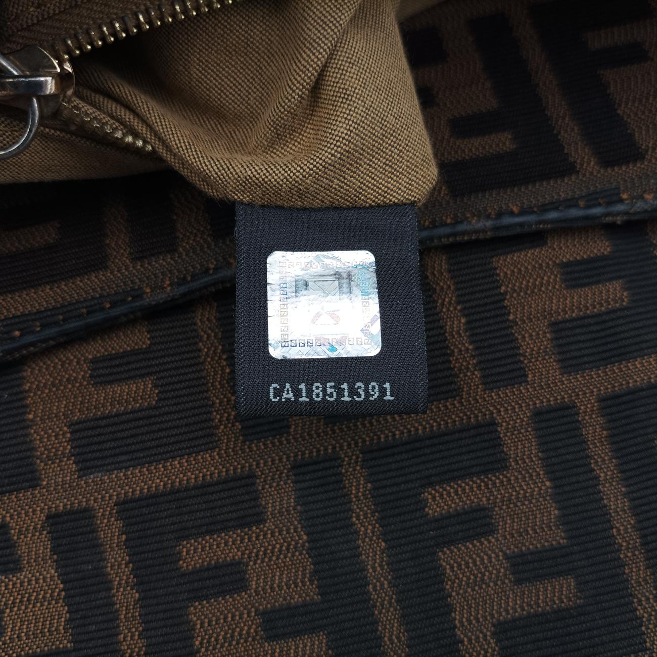 Pre-owned Fendi Chef Perforated Charm Zucca Print Brown PVC coated canvas 8BR436 shoulderbag | stylenewstar