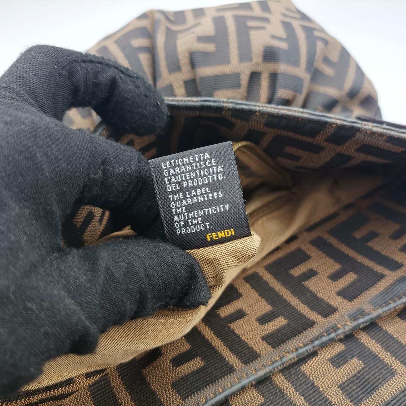 Pre-owned Fendi Chef Perforated Charm Zucca Print Brown PVC coated canvas 8BR436 shoulderbag | stylenewstar