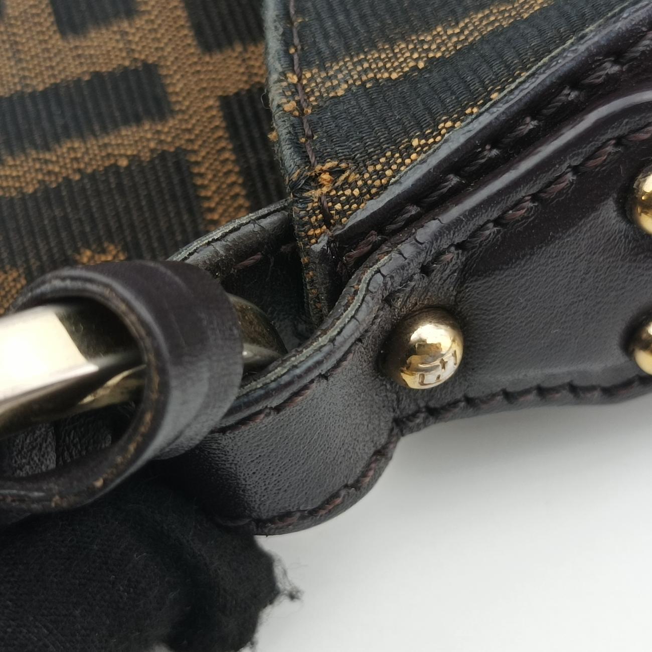 Pre-owned Fendi Chef Perforated Charm Zucca Print Brown PVC coated canvas 8BR436 shoulderbag | stylenewstar