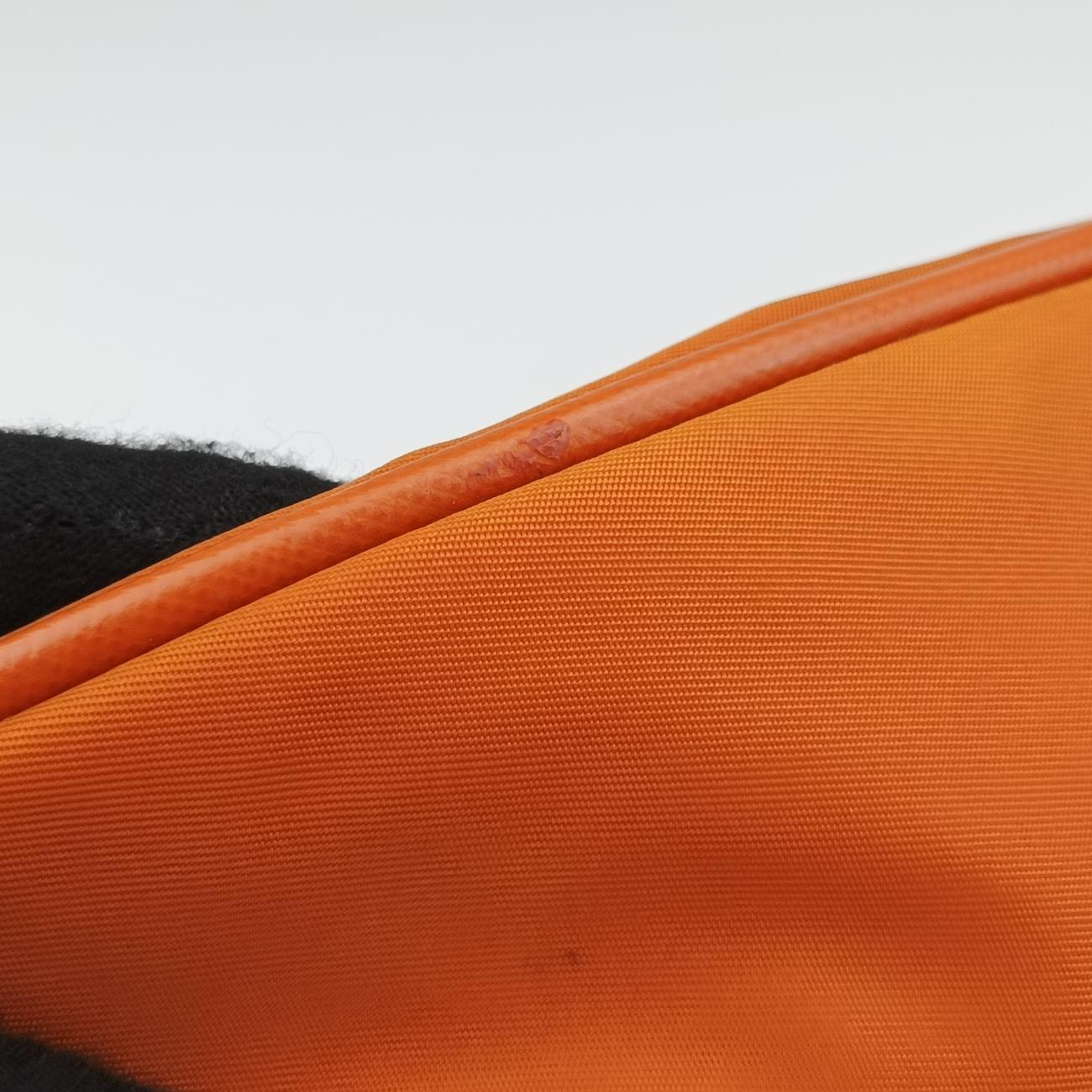 Vintage Prada Triangle Logo Orange nylon  shoulderbag | stylenewstar