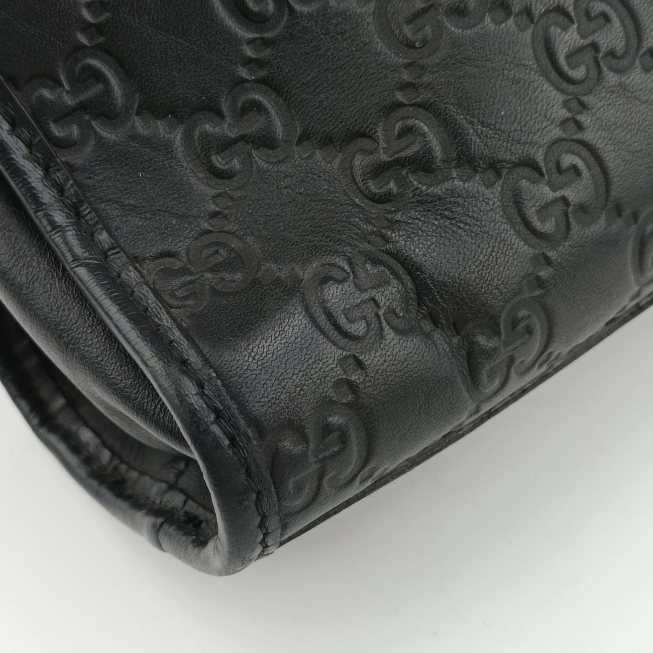 Vintage Gucci Guccissima Black Leather 246410 handbag | stylenewstar