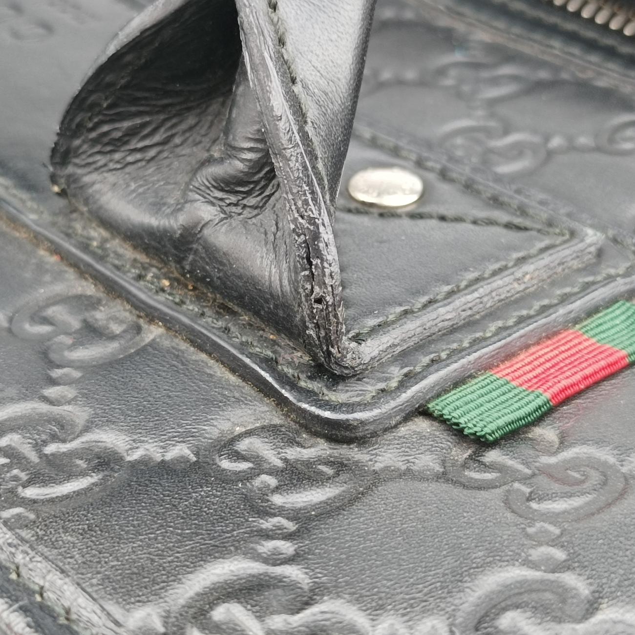 Vintage Gucci Guccissima Black Leather 246410 handbag | stylenewstar