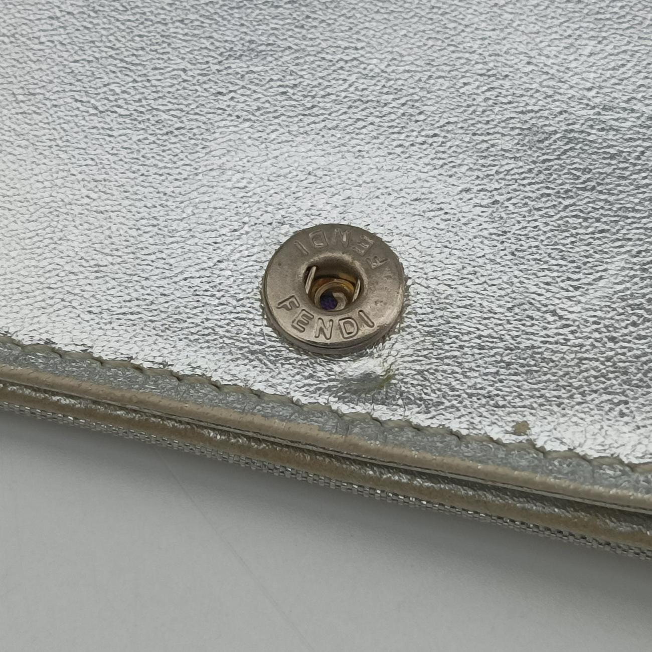 Pre-owned Fendi Embossed Logo Silver Canvas 8M0219 shoulderbag | stylenewstar