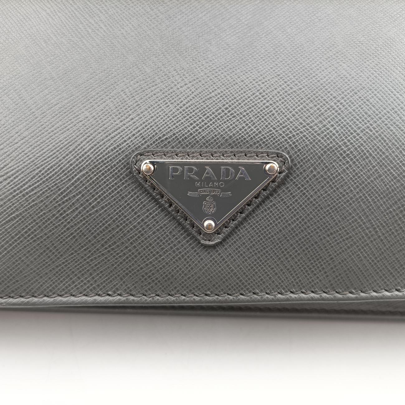 Vintage Prada Triangle Logo Plate Grey Saffiano Leather  handbag | stylenewstar
