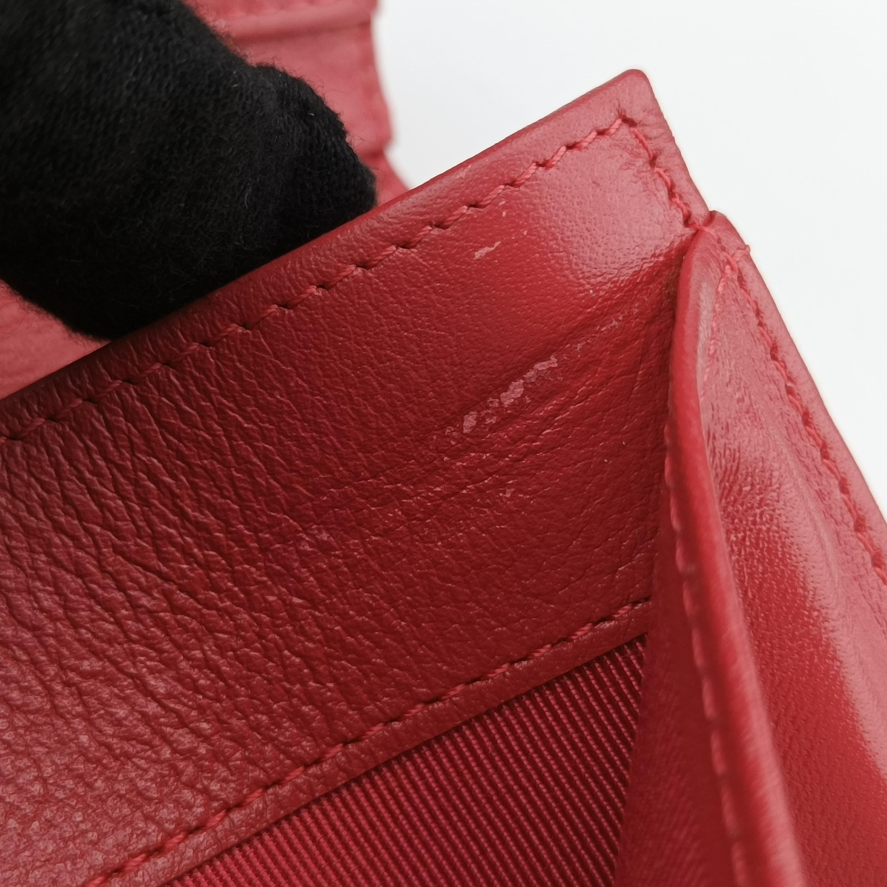 Pre-owned Chanel Quilted CC logo Orange Patent A31509 long-wallet | stylenewstar