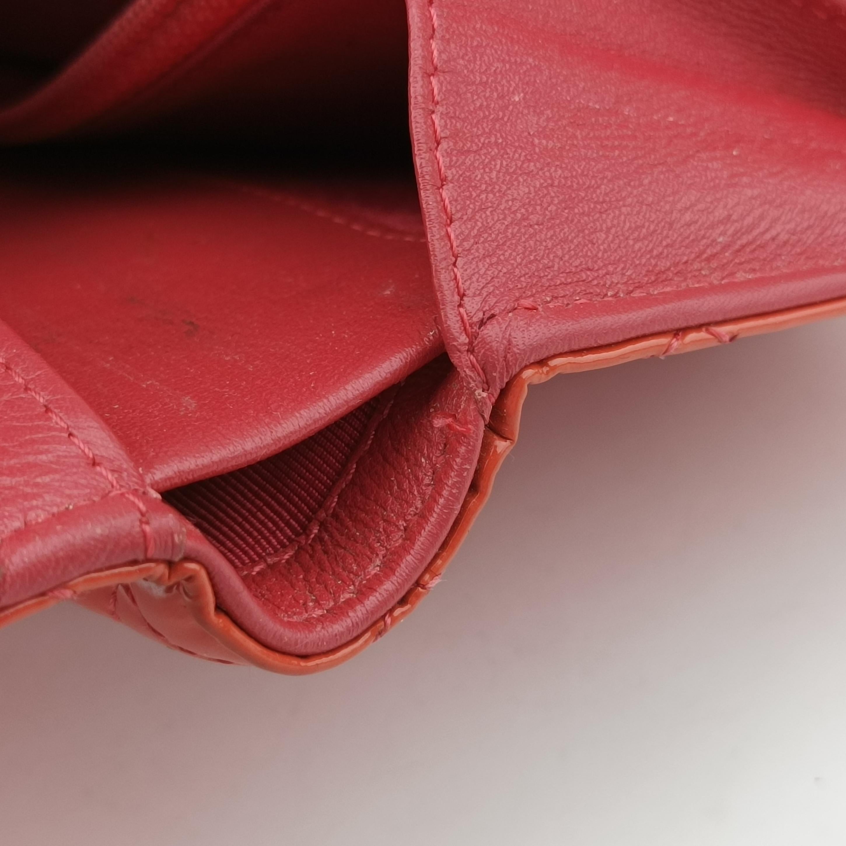 Pre-owned Chanel Quilted CC logo Orange Patent A31509 long-wallet | stylenewstar