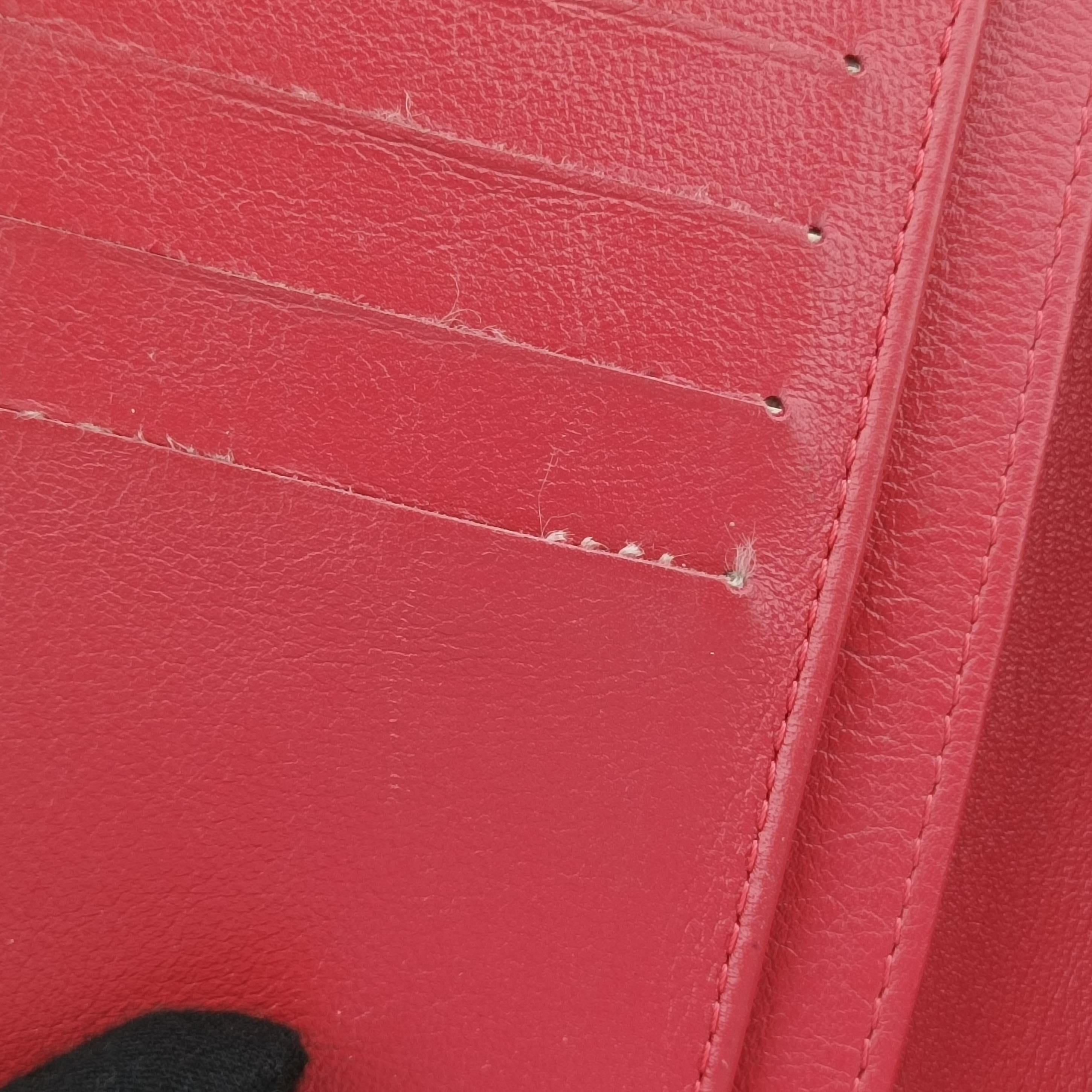 Pre-owned Chanel Quilted CC logo Orange Patent A31509 long-wallet | stylenewstar