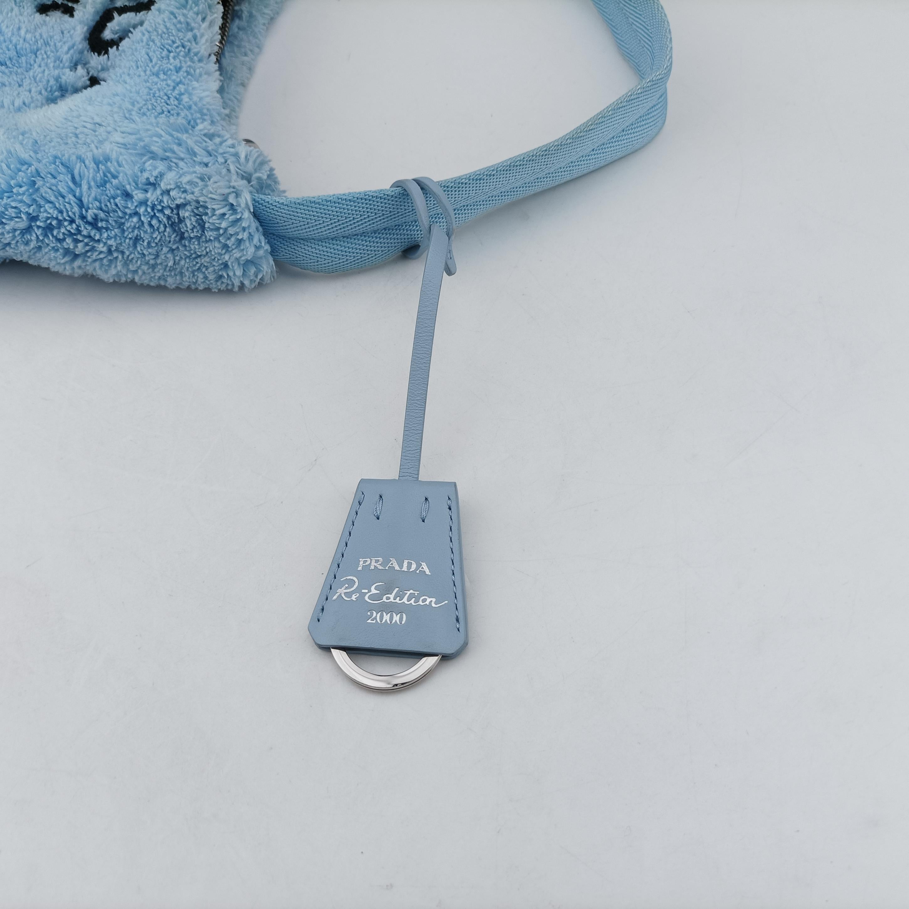 Vintage Prada Re-Edition2000 Blue Terry cloth 1NE515 handbag | stylenewstar