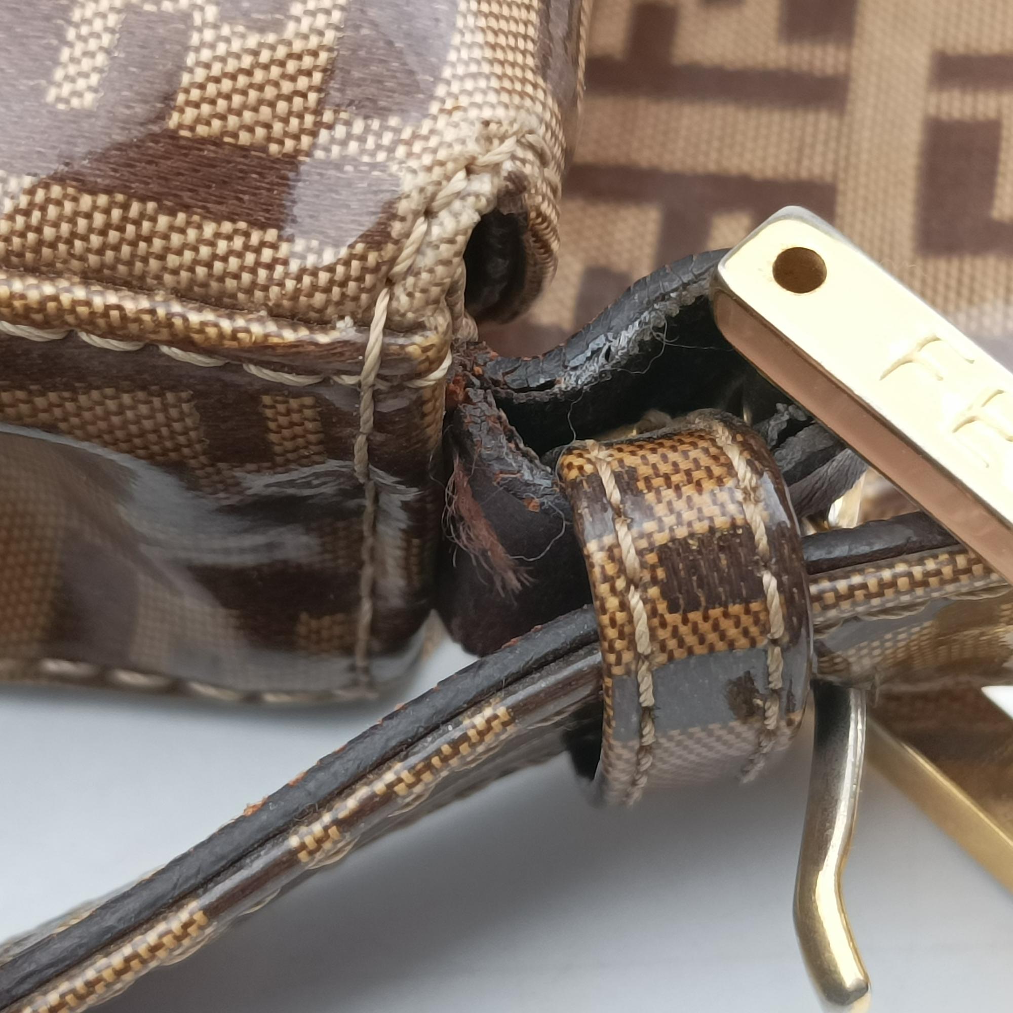 Vintage Fendi Mamma Baguette Brown PVC coated canvas 26725 handbag | stylenewstar