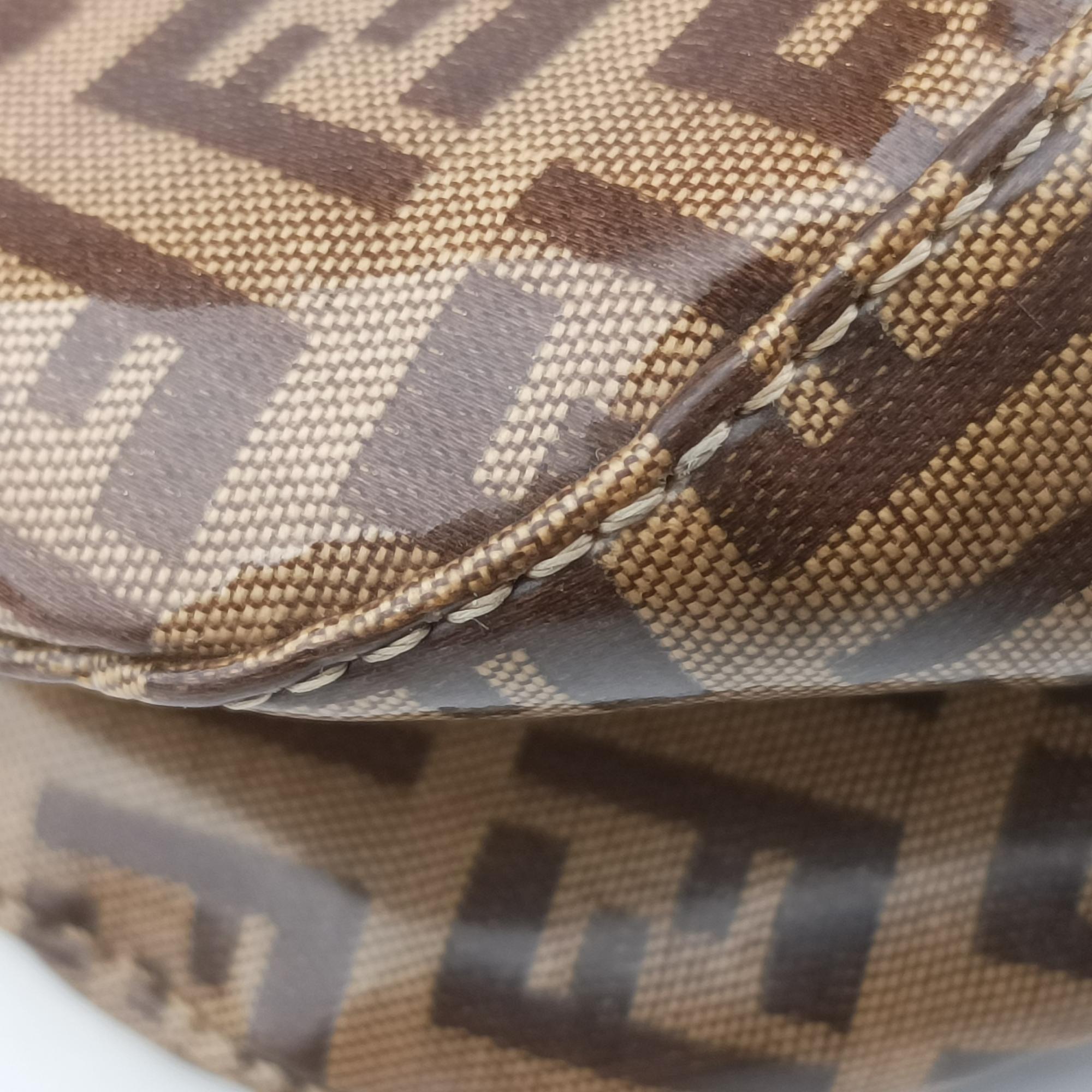 Vintage Fendi Mamma Baguette Brown PVC coated canvas 26725 handbag | stylenewstar