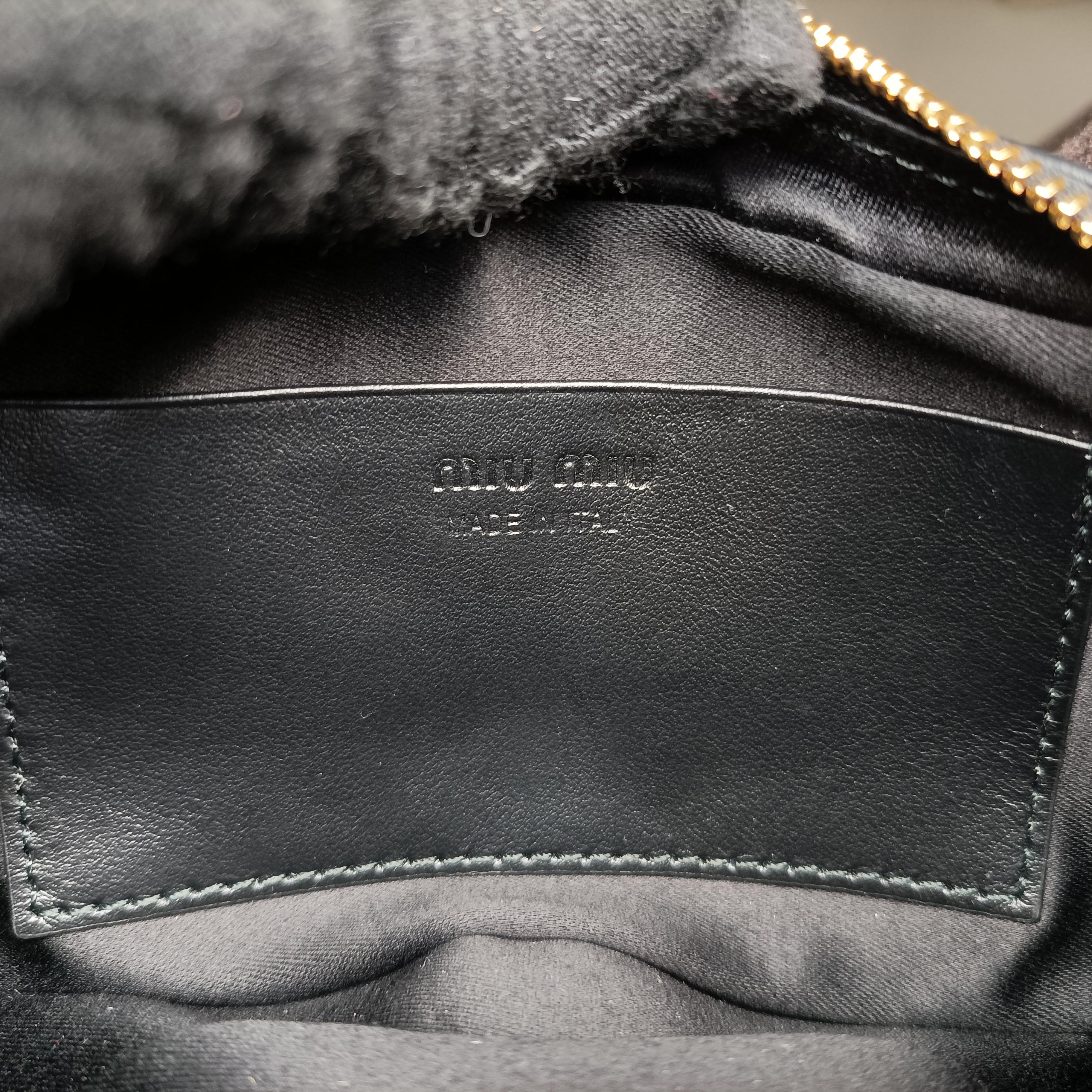 Pre-owned Miu Miu logo Black leather  bum bag/waist bag | stylenewstar