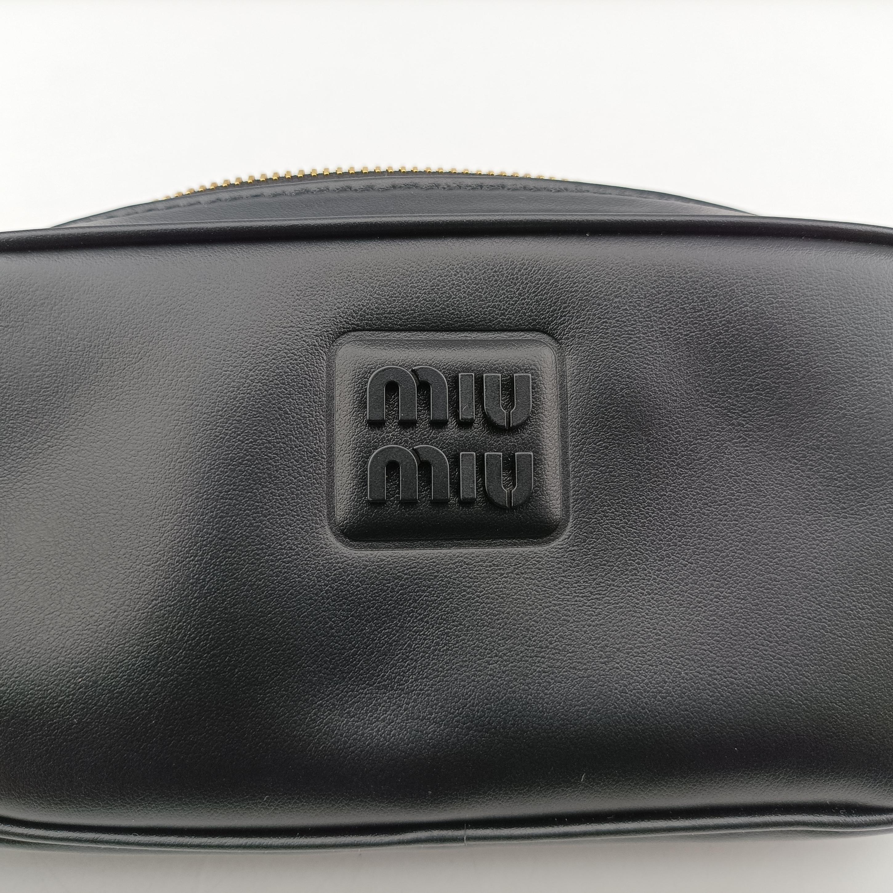 Pre-owned Miu Miu logo Black leather  bum bag/waist bag | stylenewstar