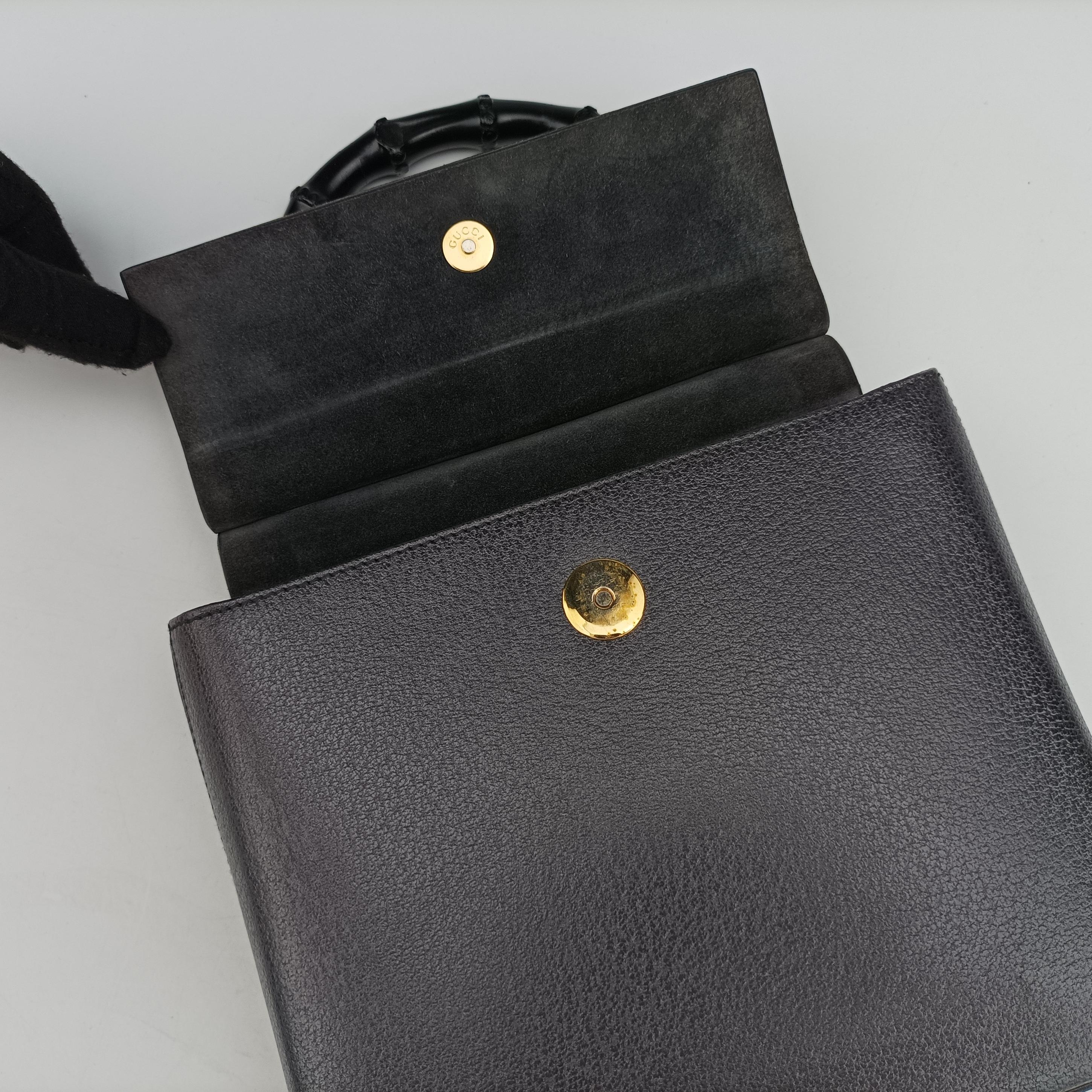 Secondhand Gucci bamboo Black Leather 001.10 handbag | stylenewstar