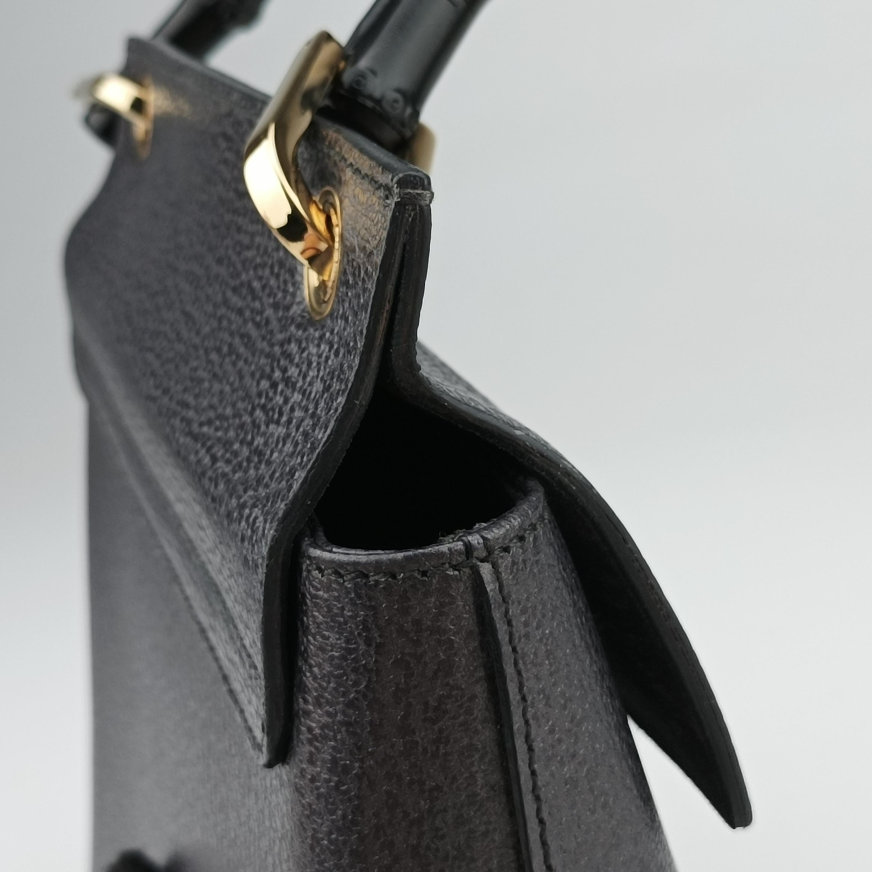 Secondhand Gucci bamboo Black Leather 001.10 handbag | stylenewstar