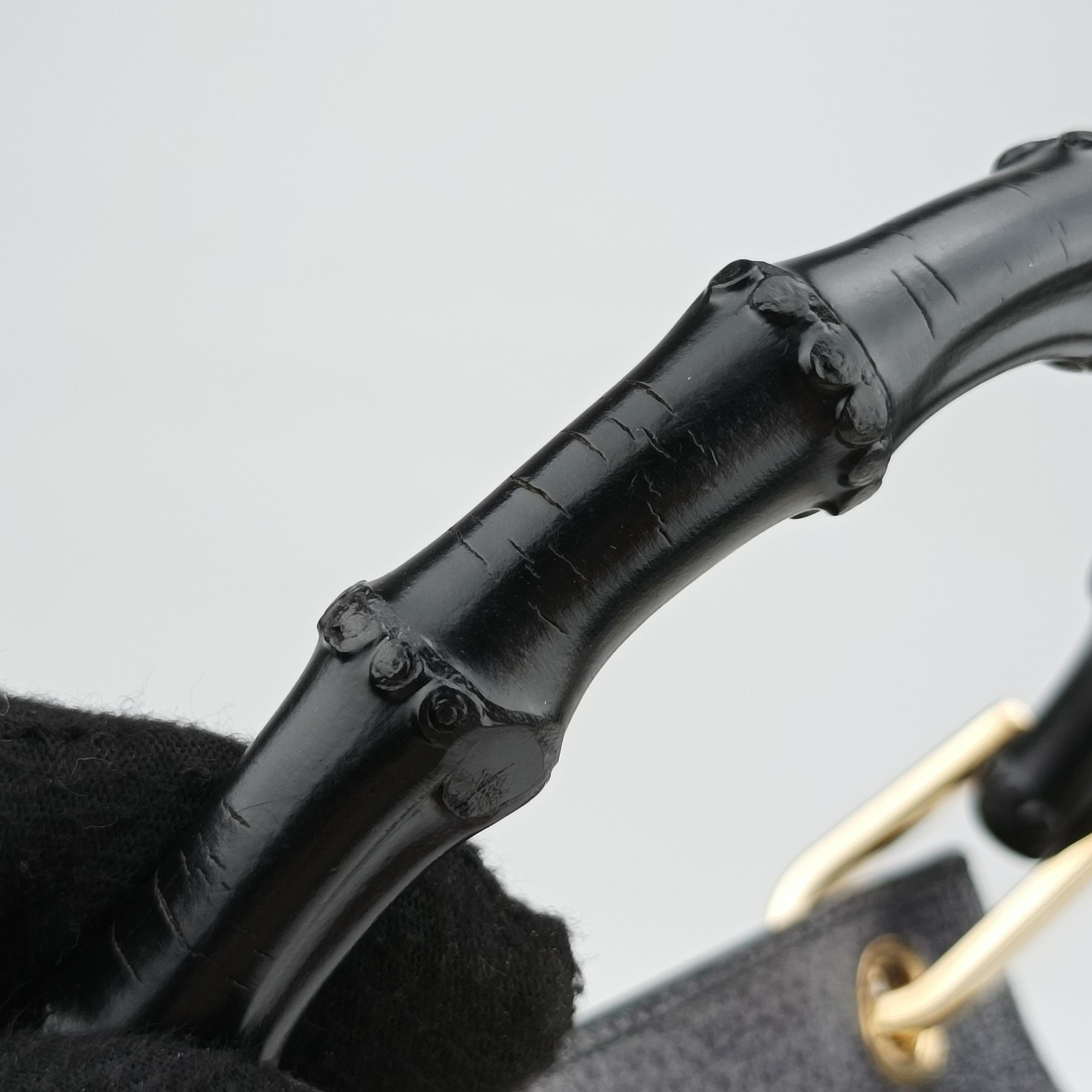 Secondhand Gucci bamboo Black Leather 001.10 handbag | stylenewstar