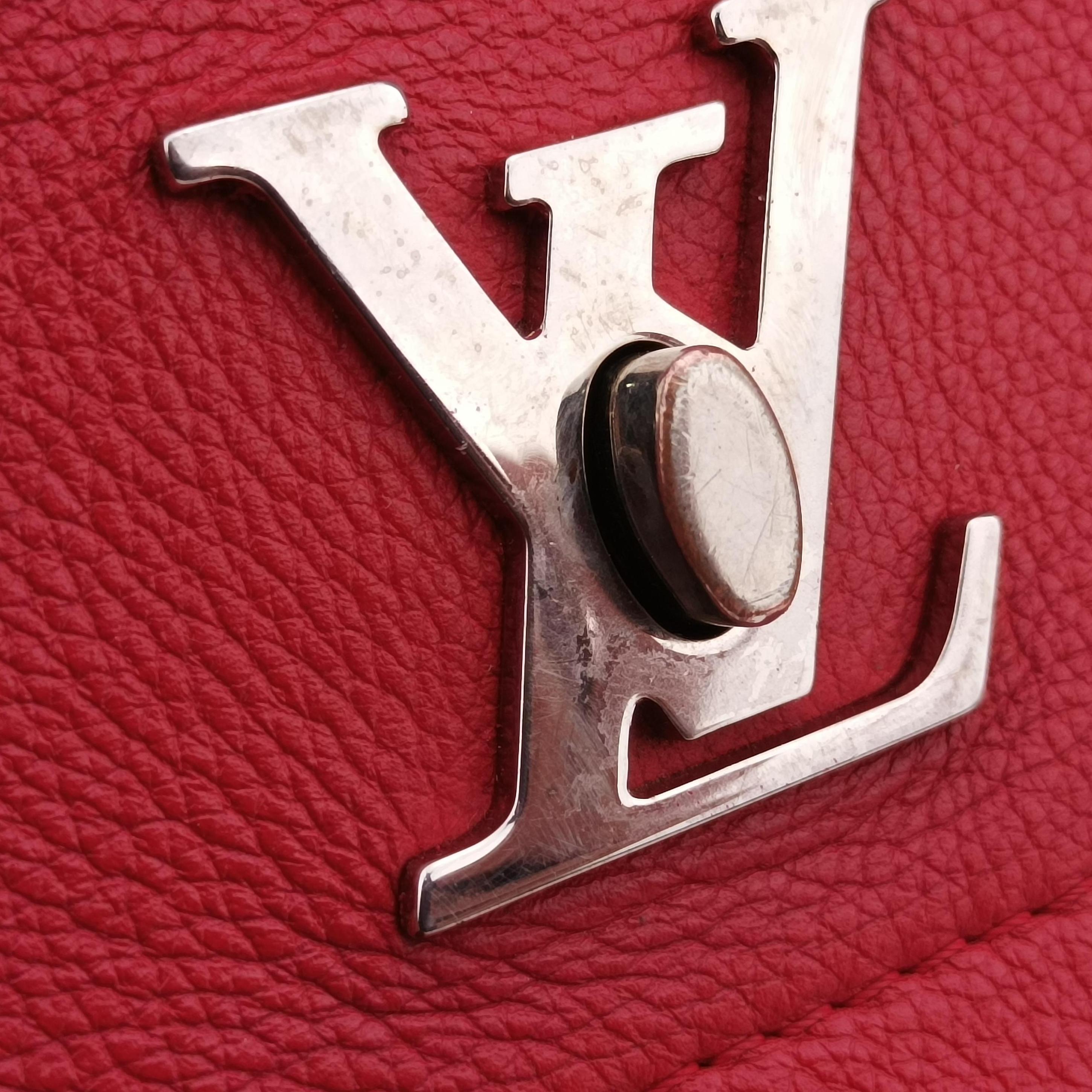 Pre-owned Louis Vuitton Lockme II ruby leather M50363 shoulderbag | stylenewstar