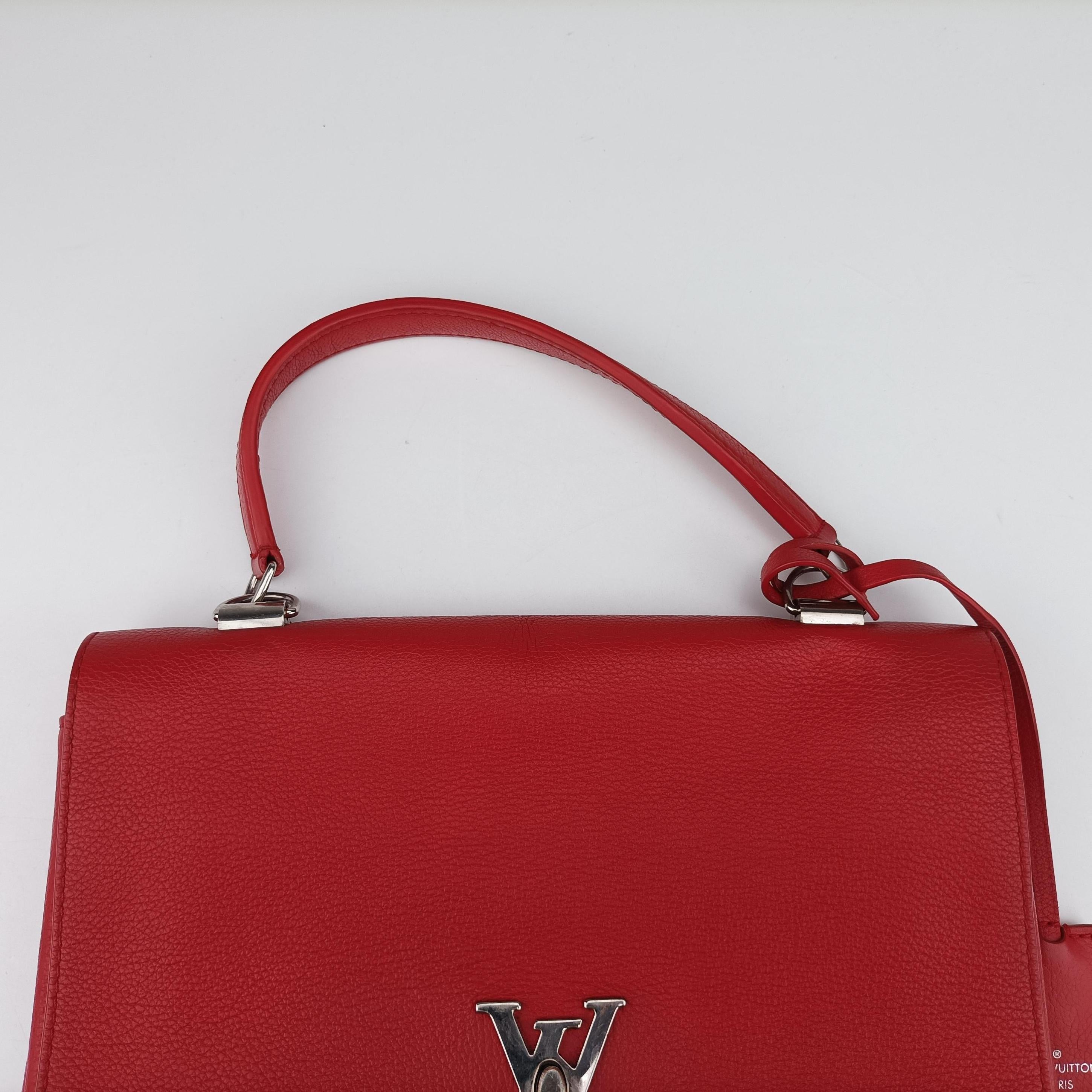 Pre-owned Louis Vuitton Lockme II ruby leather M50363 shoulderbag | stylenewstar
