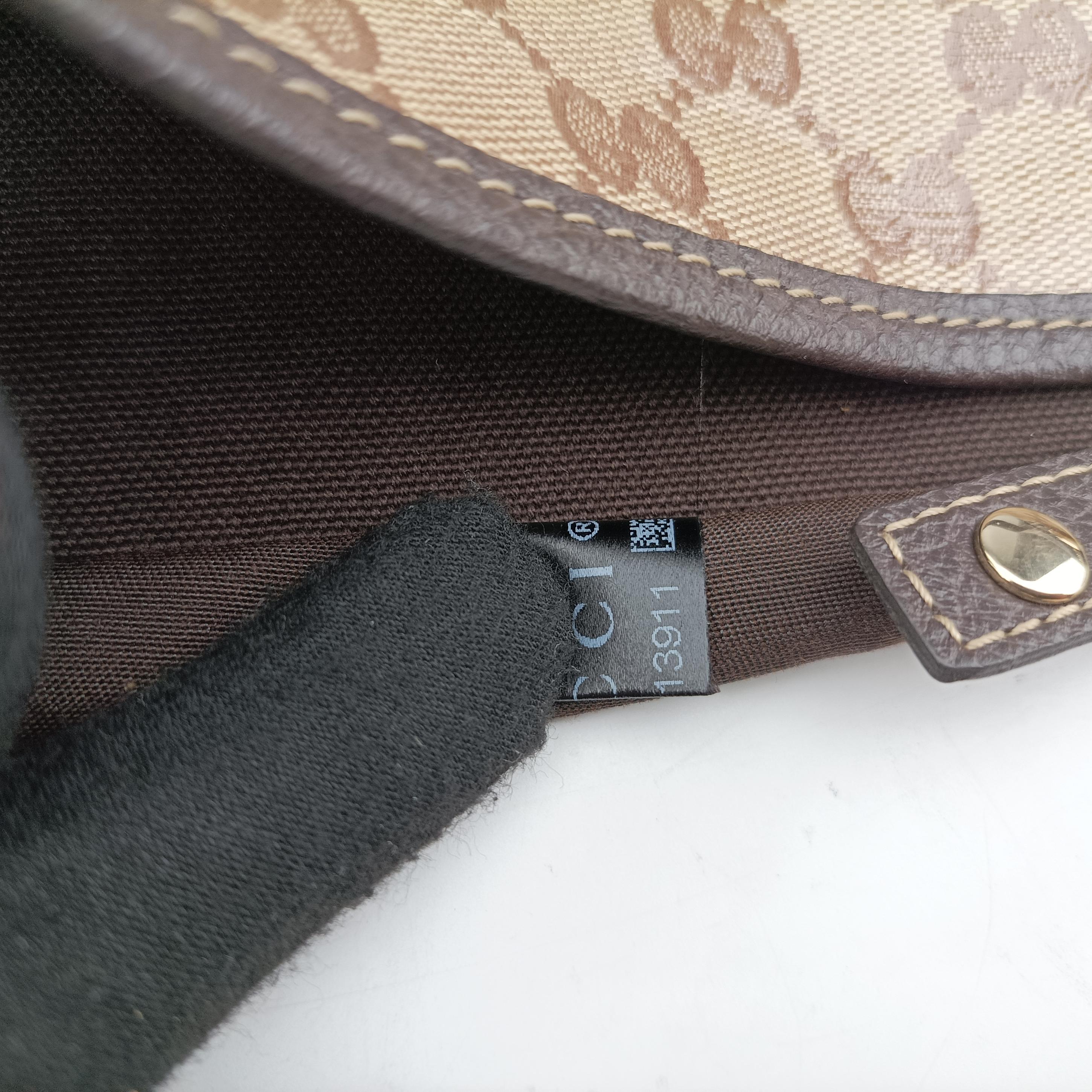 Pre-owned Gucci Abbey Brown PVC coated canvas 293578 handbag | stylenewstar