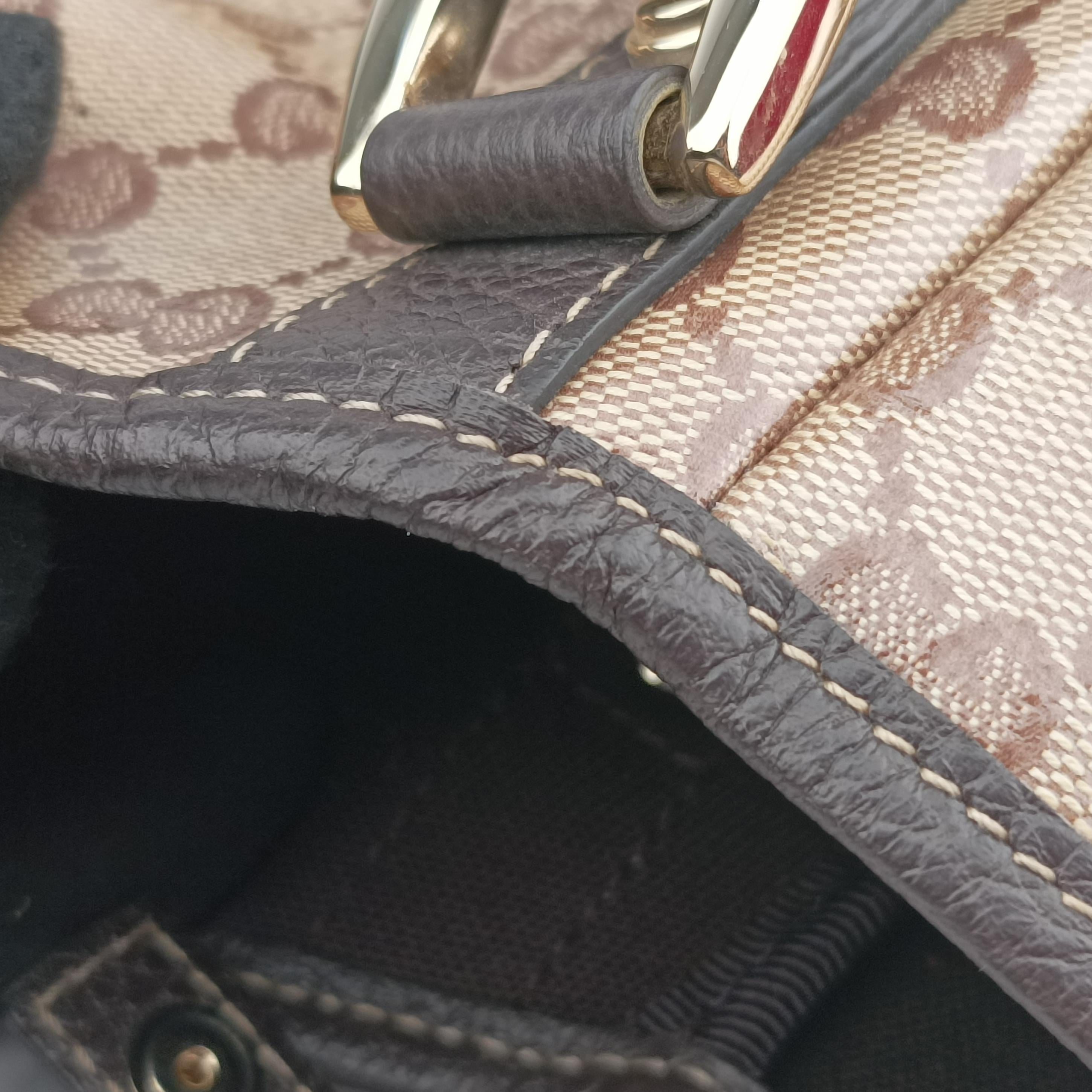 Pre-owned Gucci Abbey Brown PVC coated canvas 293578 handbag | stylenewstar
