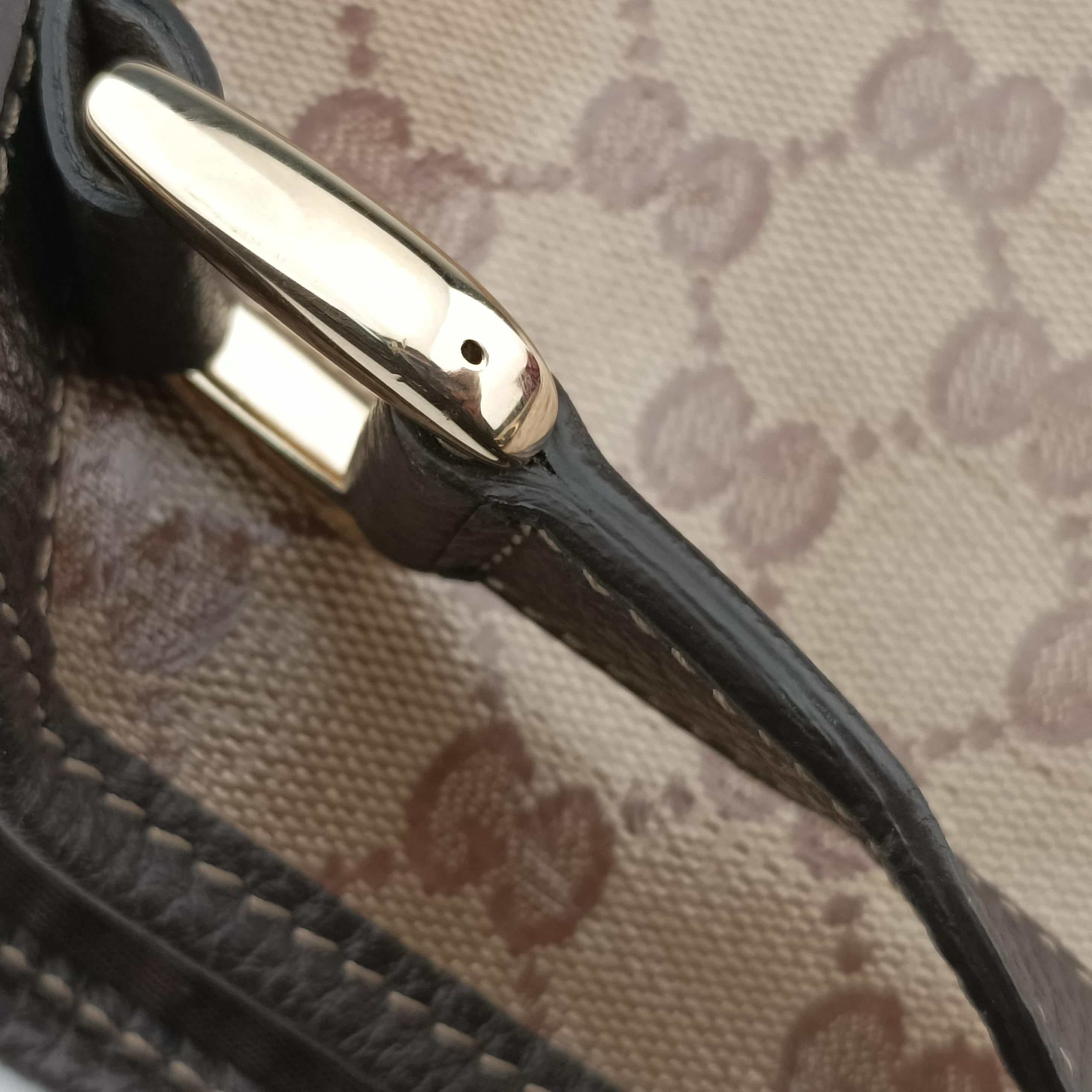 Pre-owned Gucci Abbey Brown PVC coated canvas 293578 handbag | stylenewstar