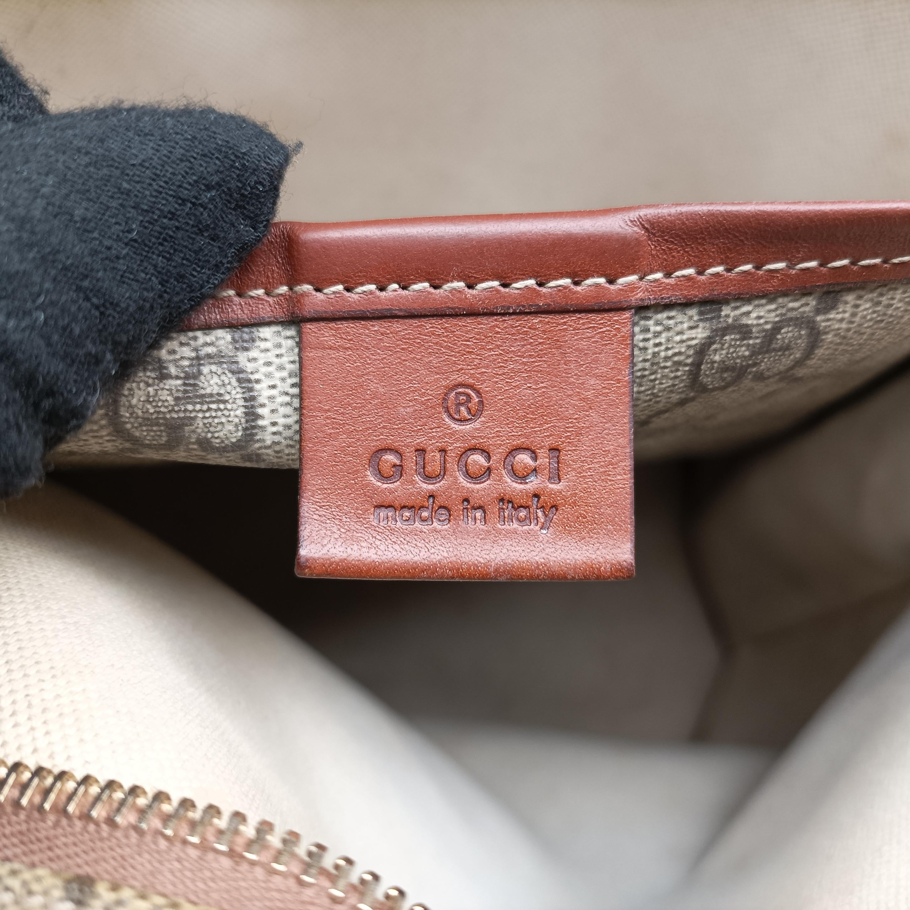 Pre-owned Gucci GG Supreme Brown PVC coated canvas 233081 handbag | stylenewstar