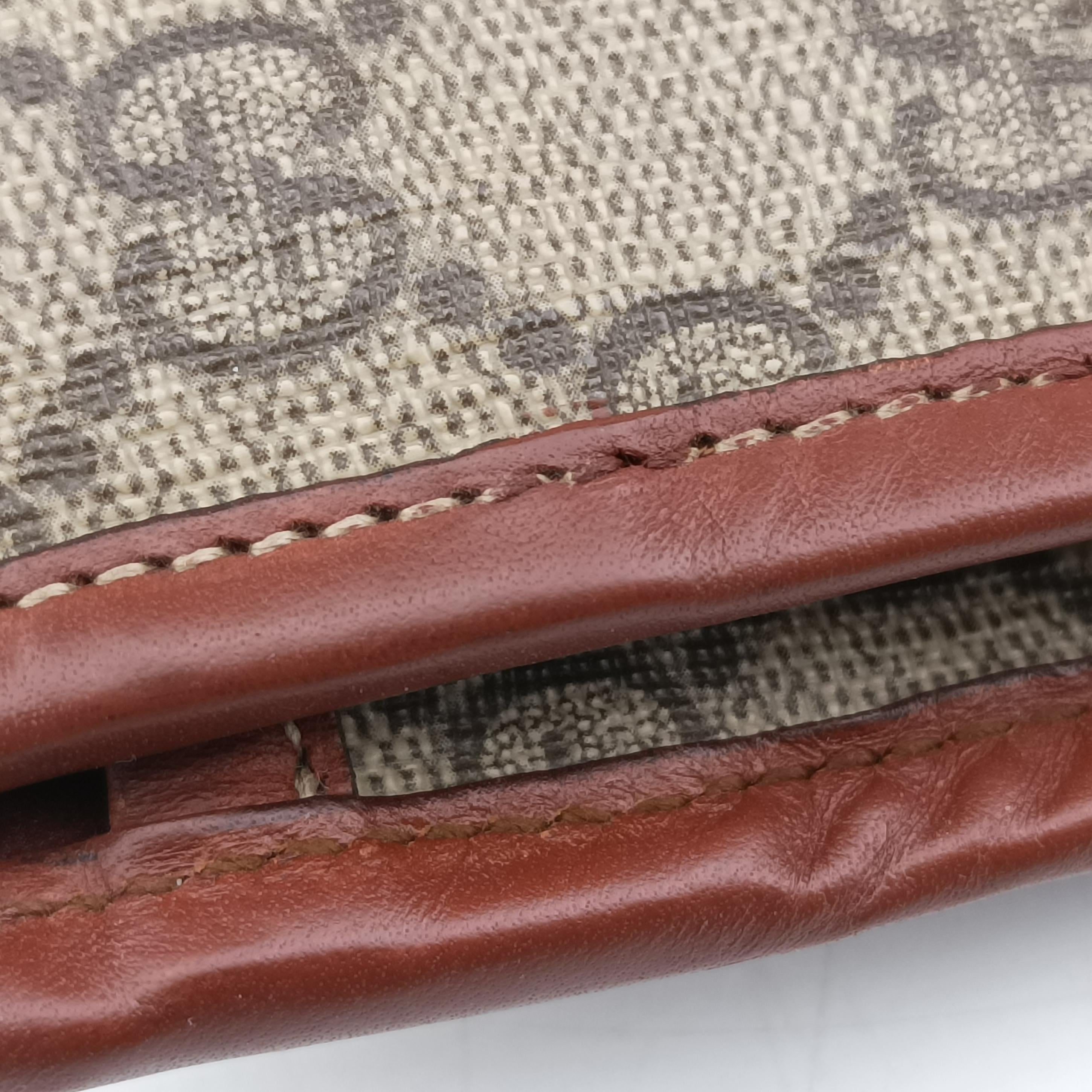 Pre-owned Gucci GG Supreme Brown PVC coated canvas 233081 handbag | stylenewstar