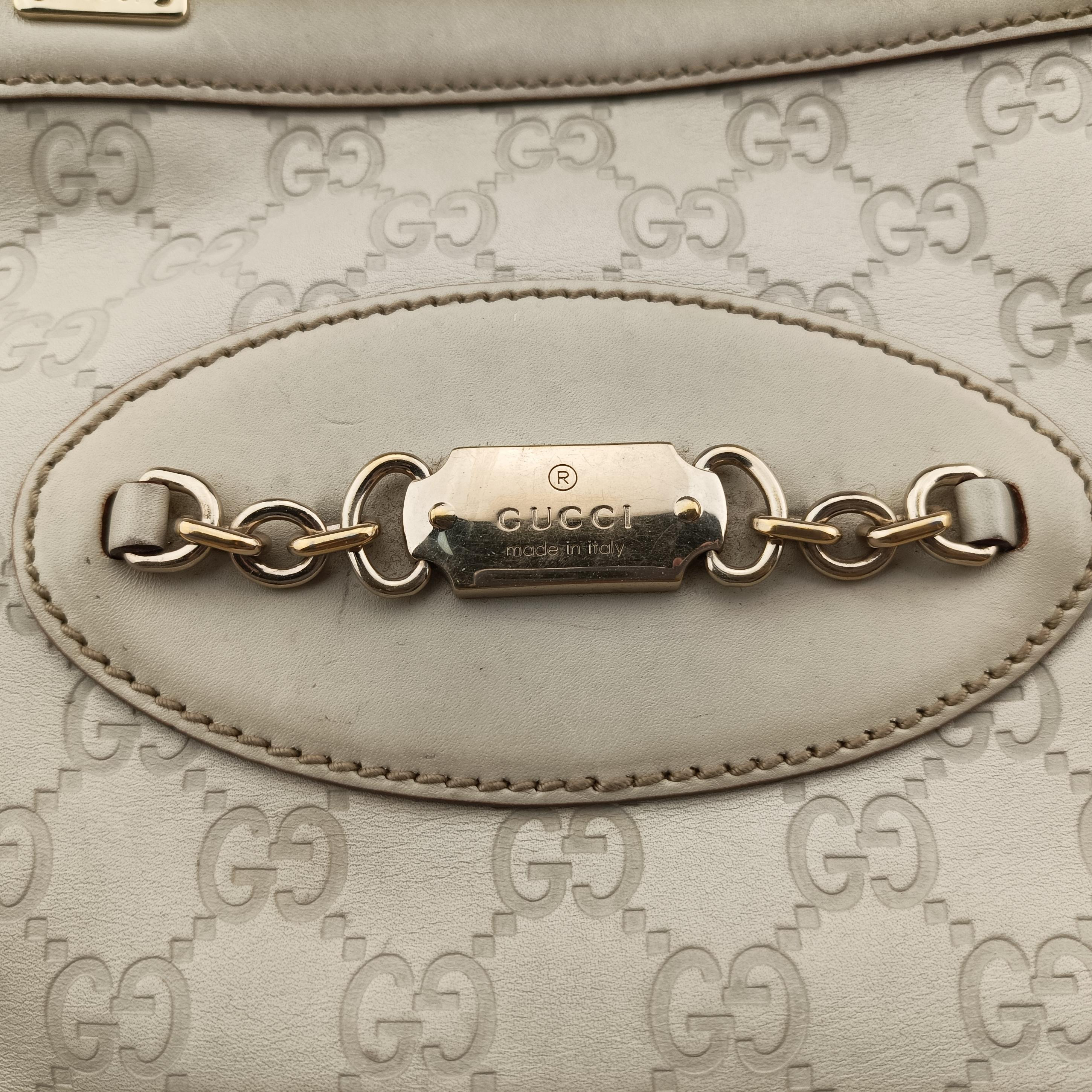 Vintage Gucci logo plate White Leather 145993 shoulderbag | stylenewstar