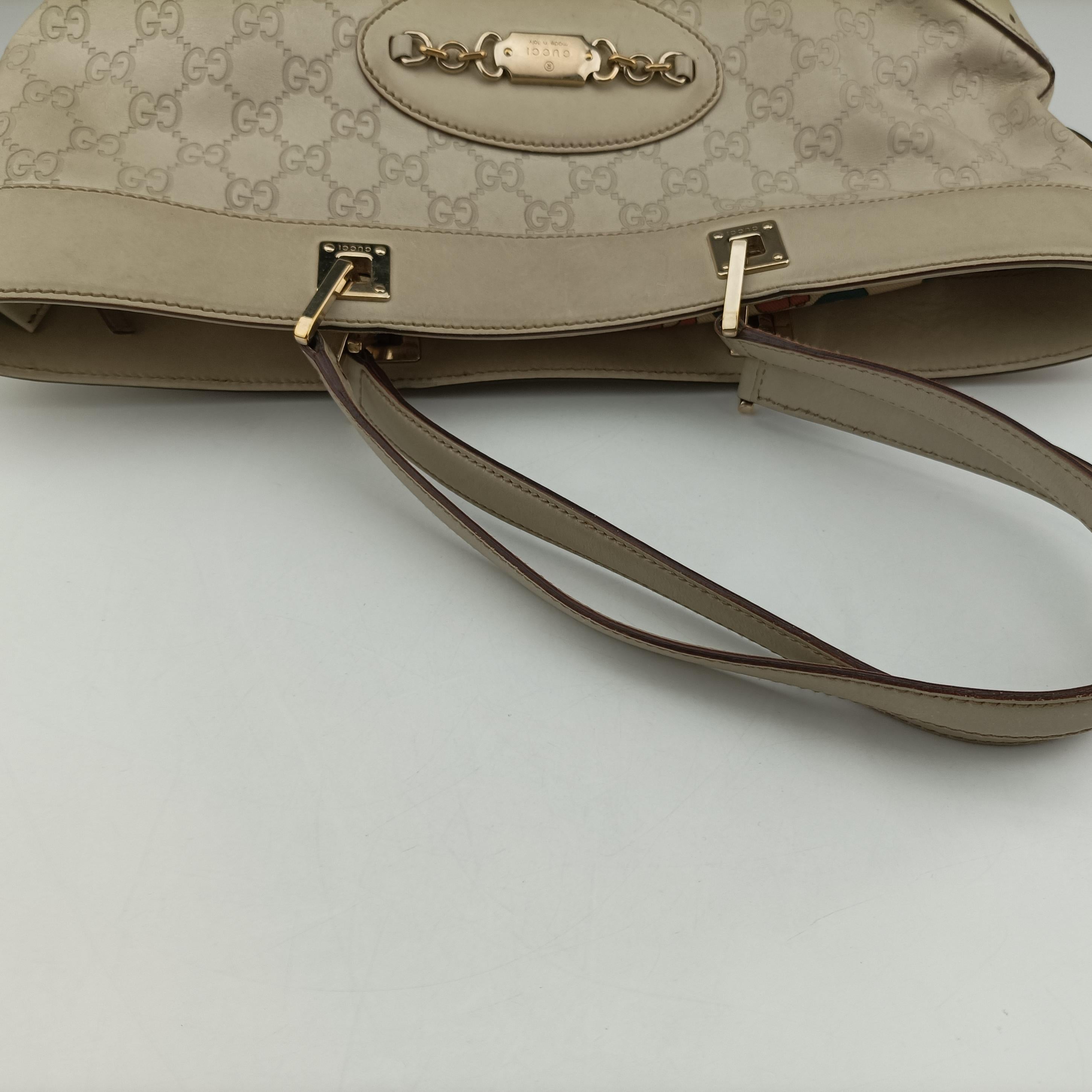 Vintage Gucci logo plate White Leather 145993 shoulderbag | stylenewstar