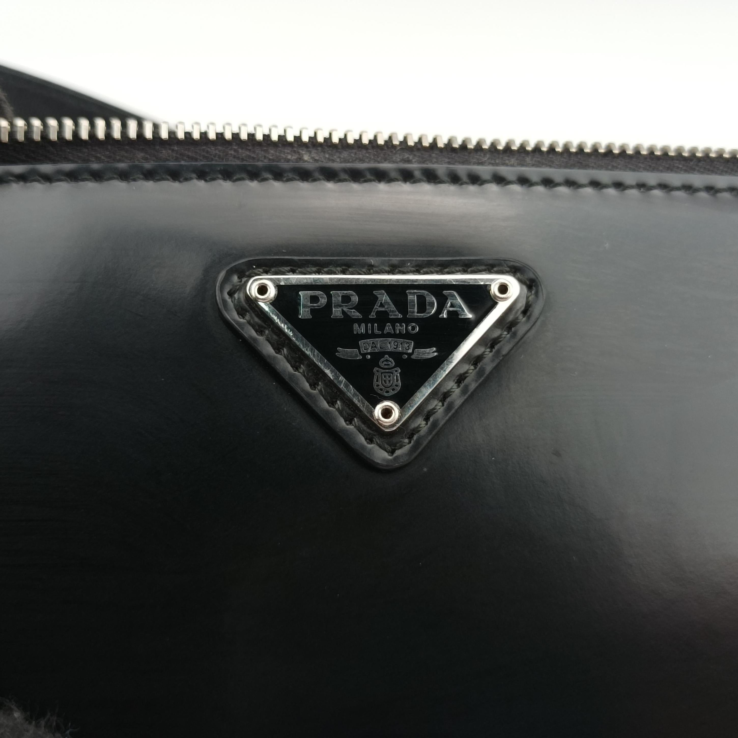 Vintage Prada Triangle Logo Black leather 1BC155 handbag | stylenewstar