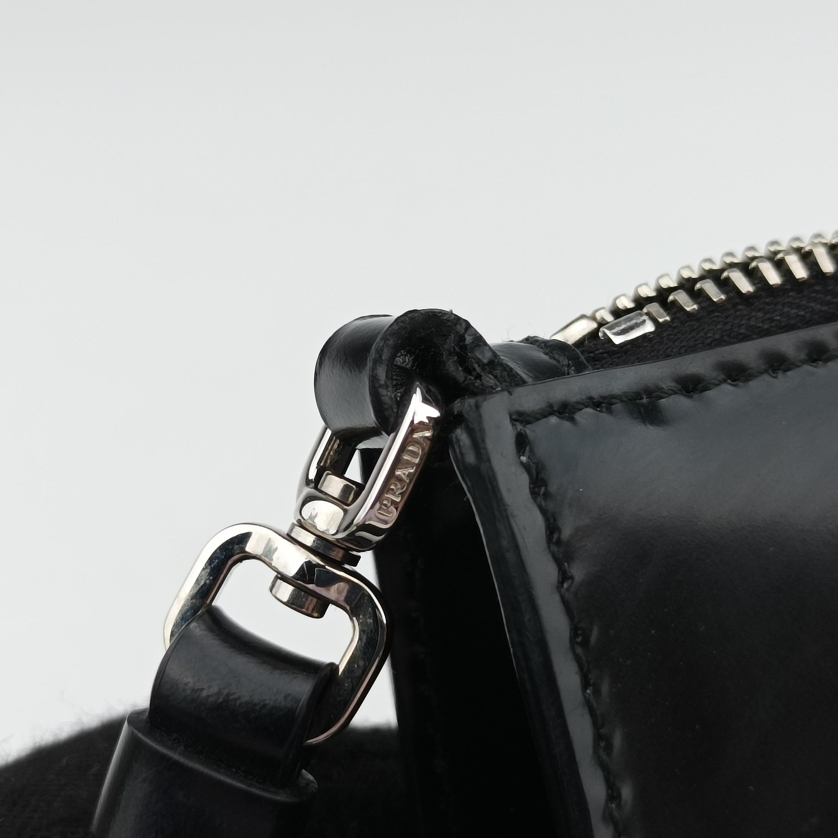 Vintage Prada Triangle Logo Black leather 1BC155 handbag | stylenewstar